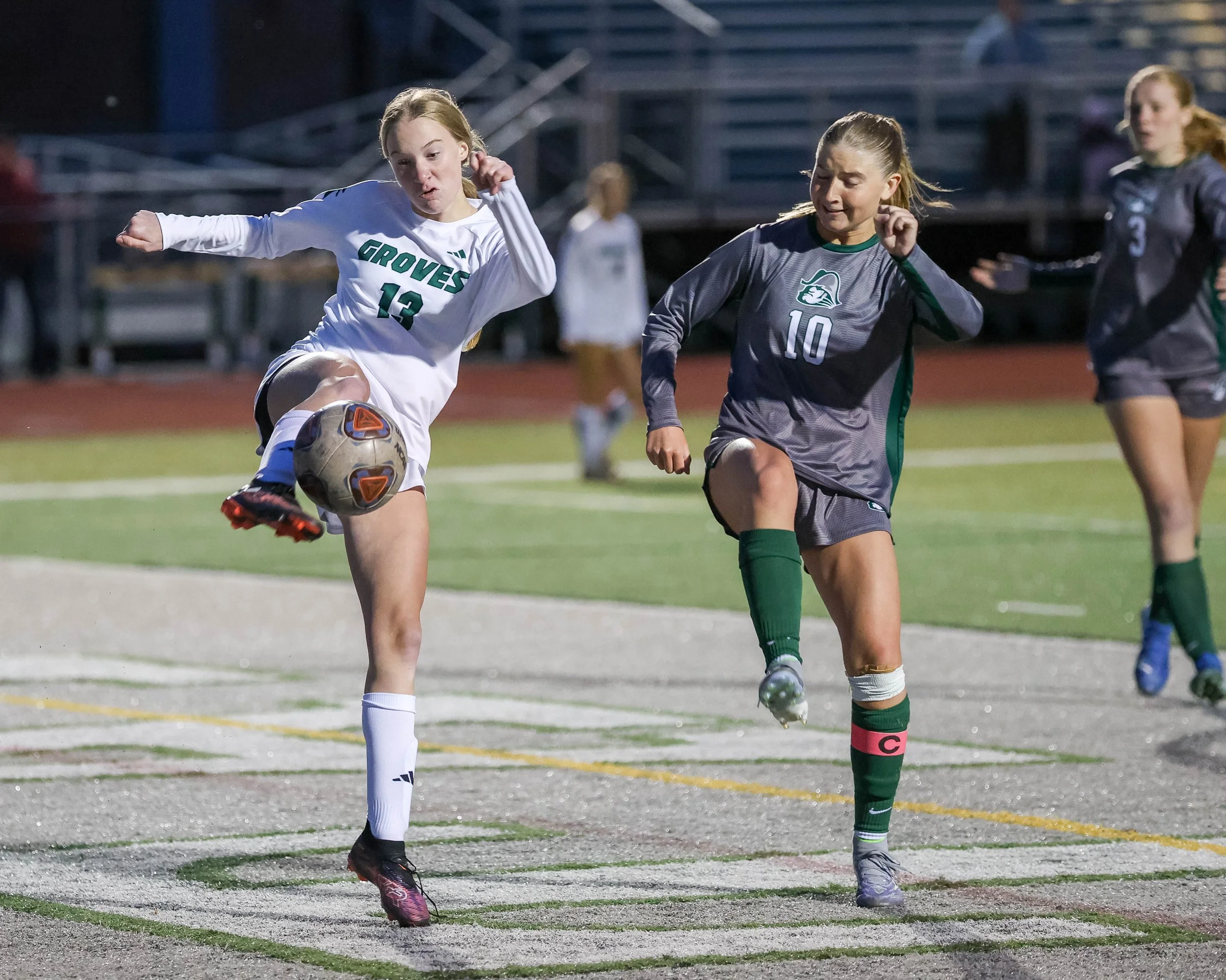 #10 goes to block the ball