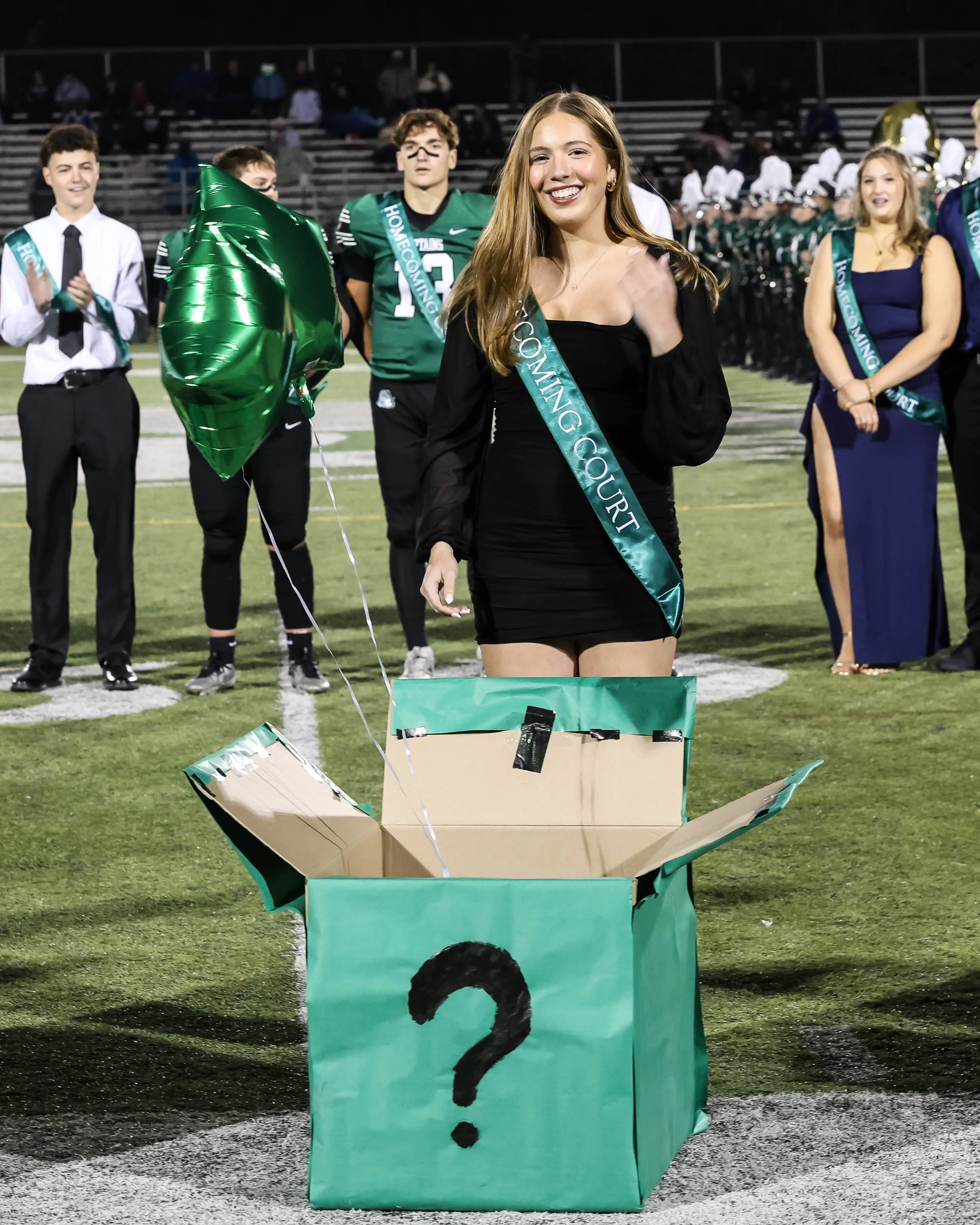 WK Homecoming Court finalist opening box