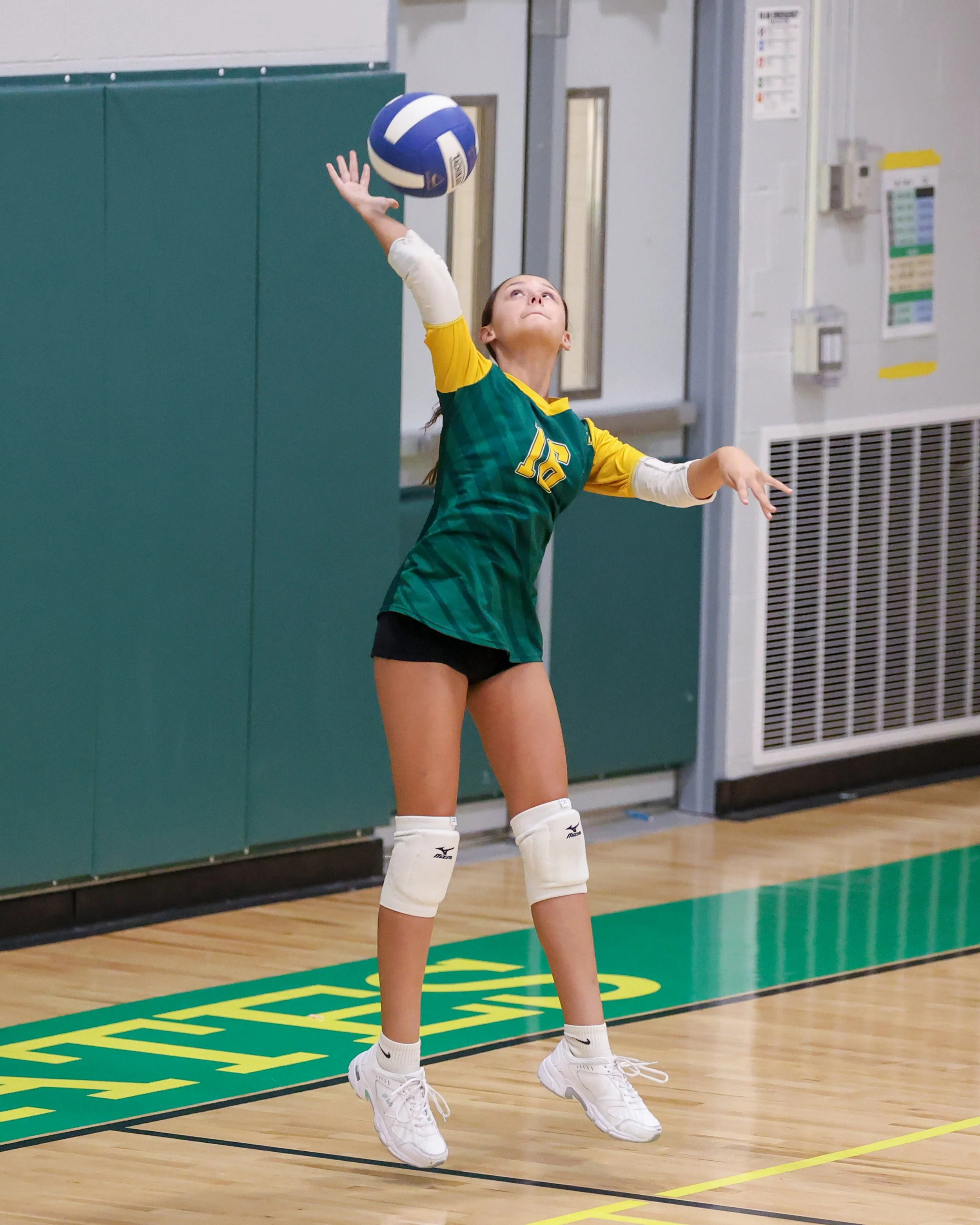 Pierce serves the ball