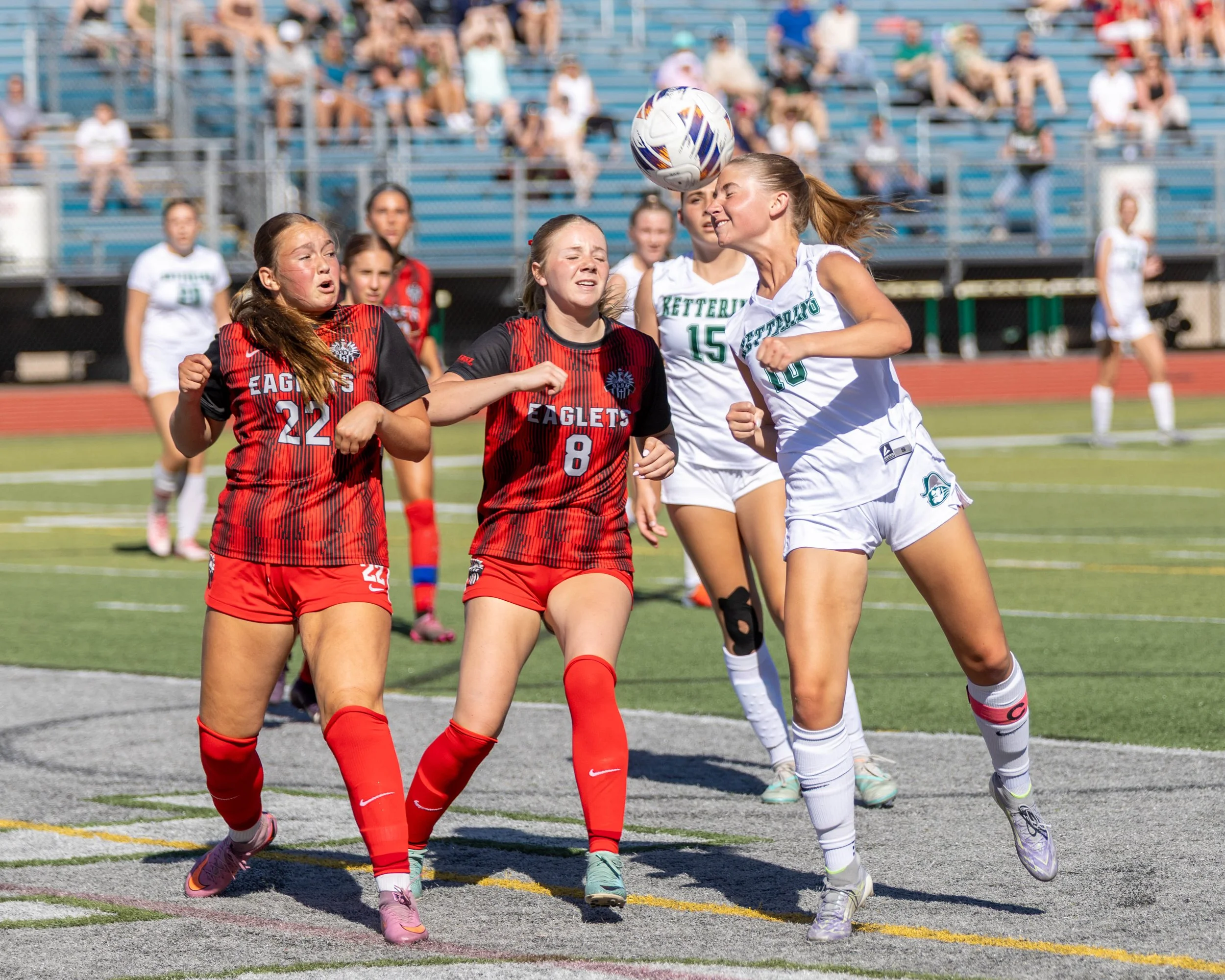 #10 heads the ball in the box