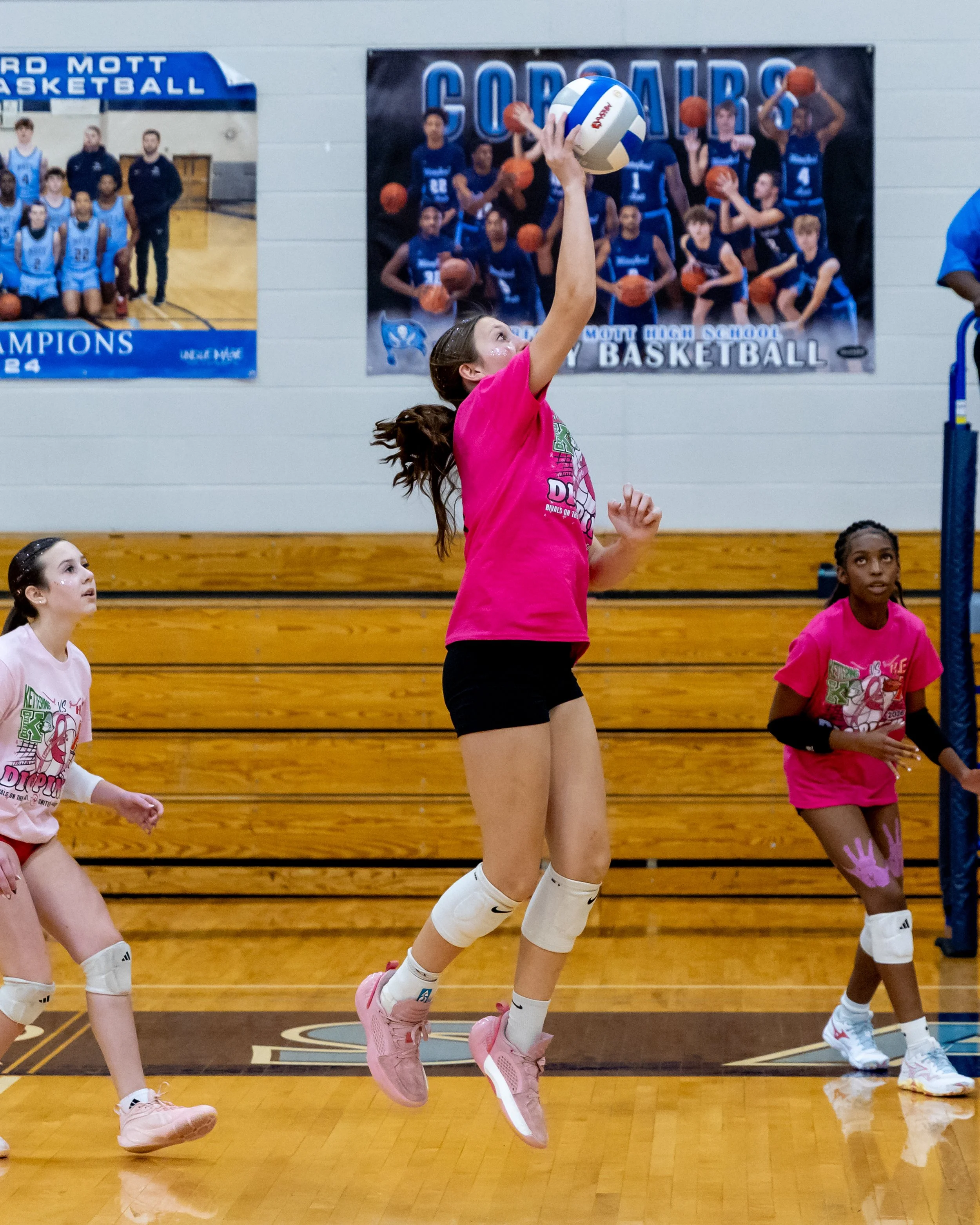 Kettering player hits the ball
