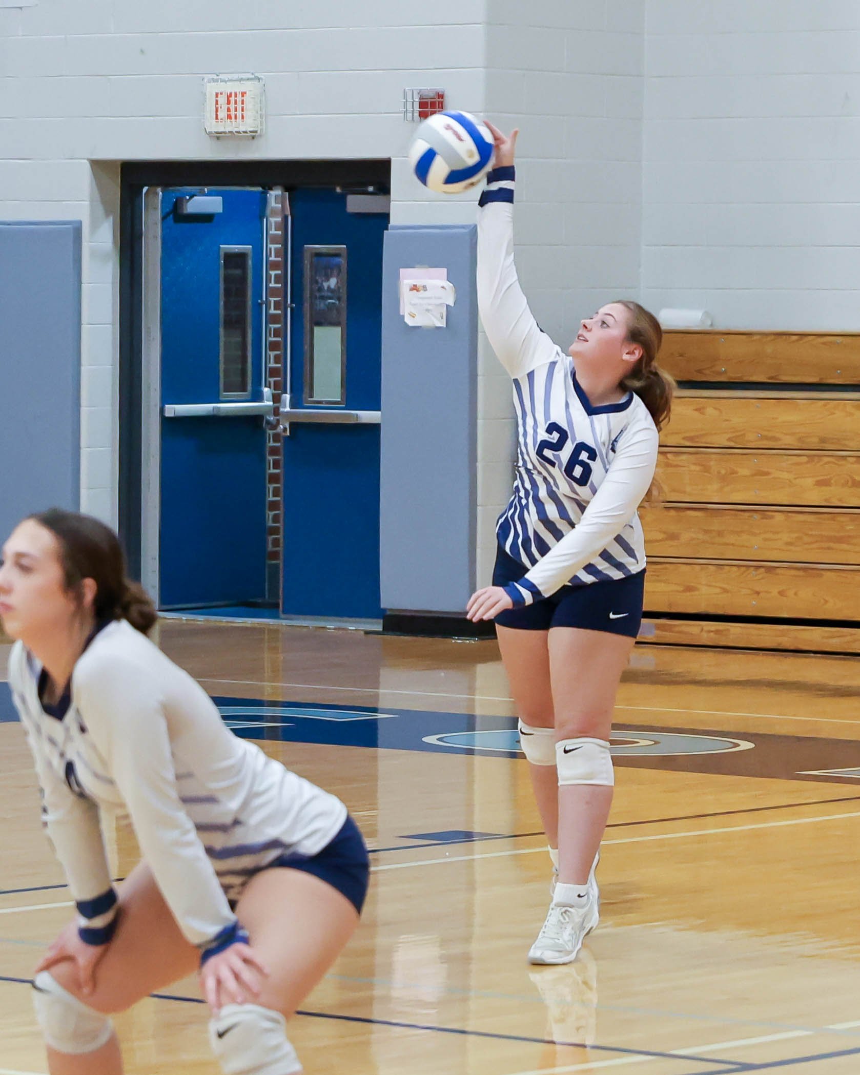 Mott #26 serves the ball
