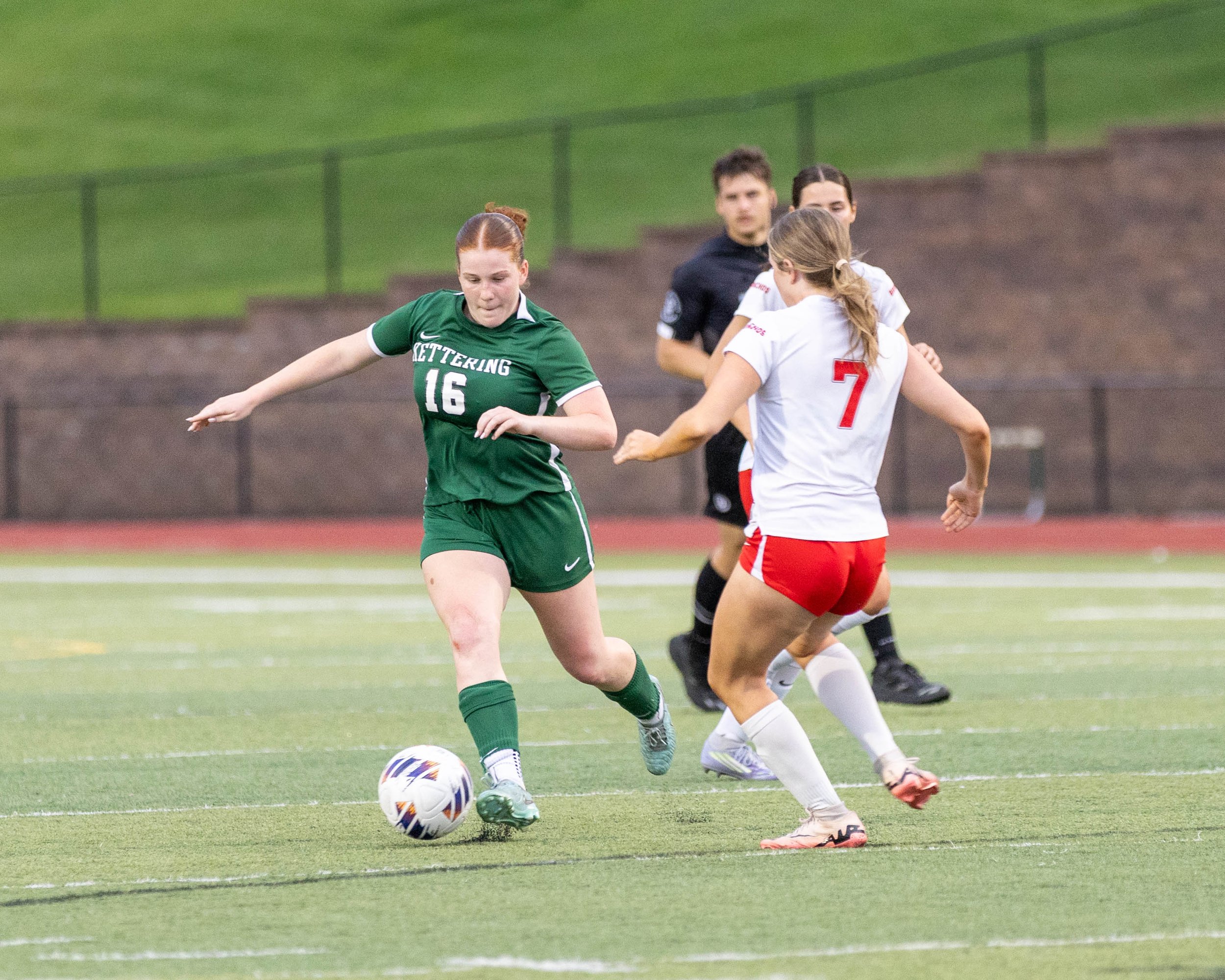 #16 dribbles past a defender