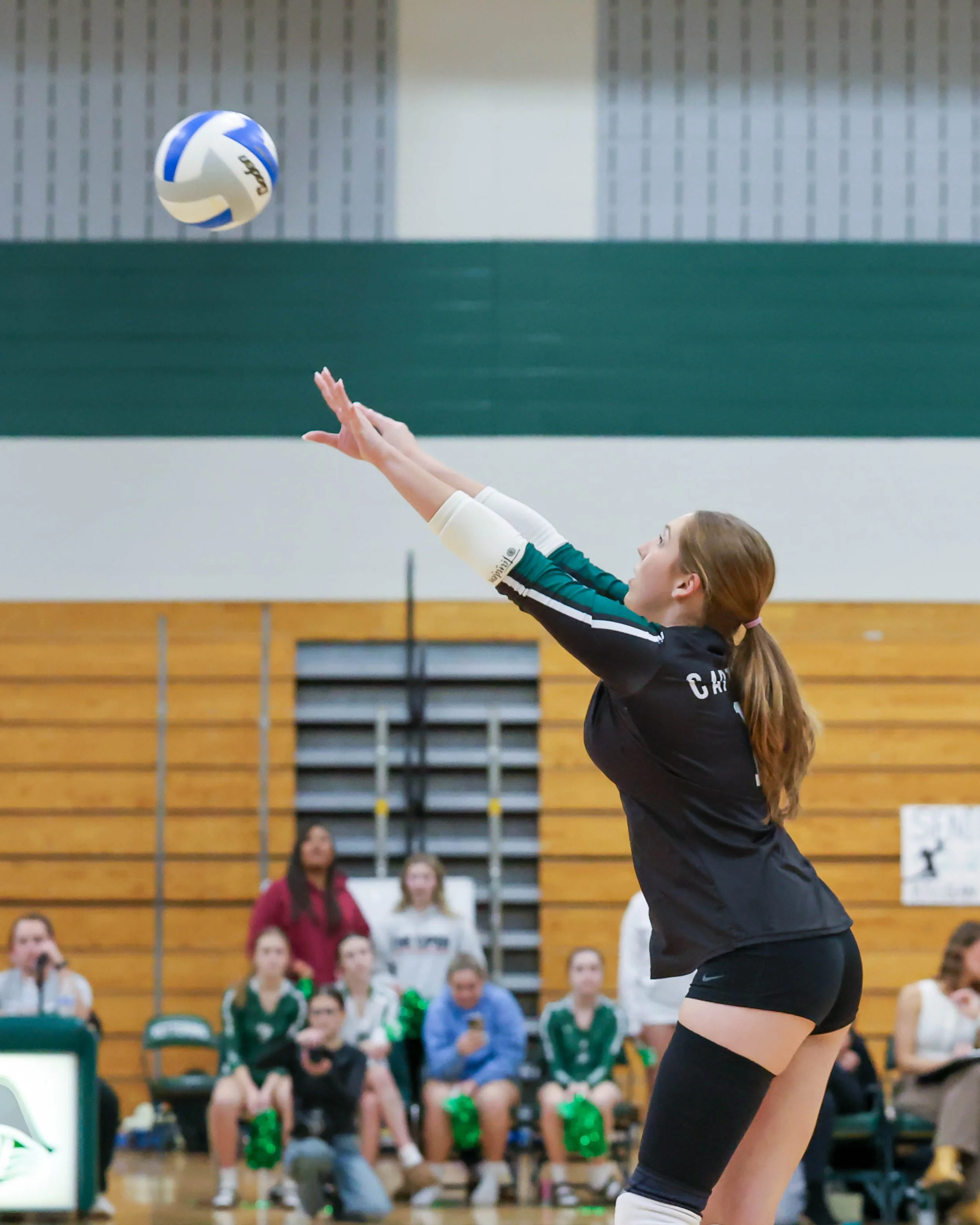 Kettering #11 returns the ball 