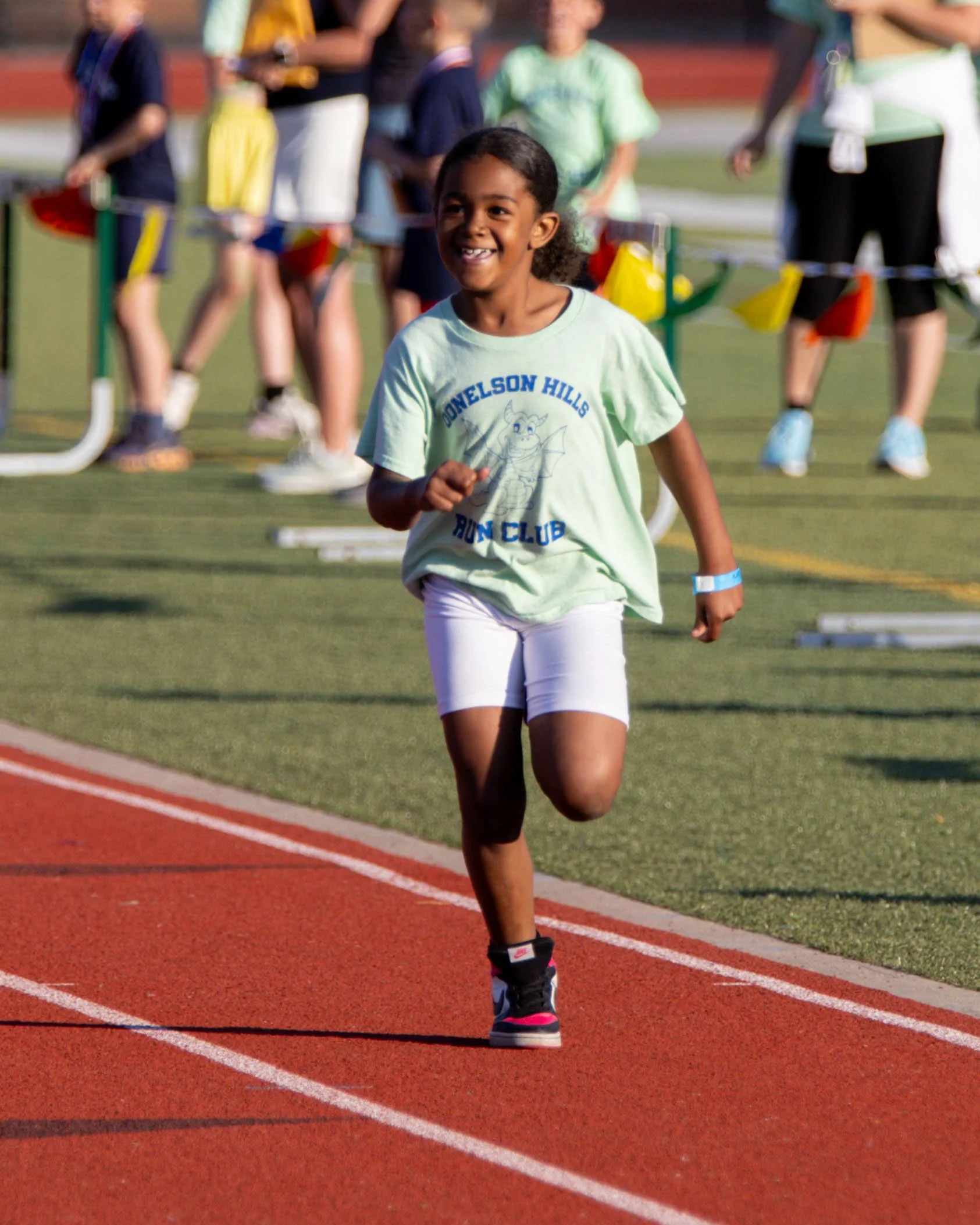 Donelson Hills runner at the finish line