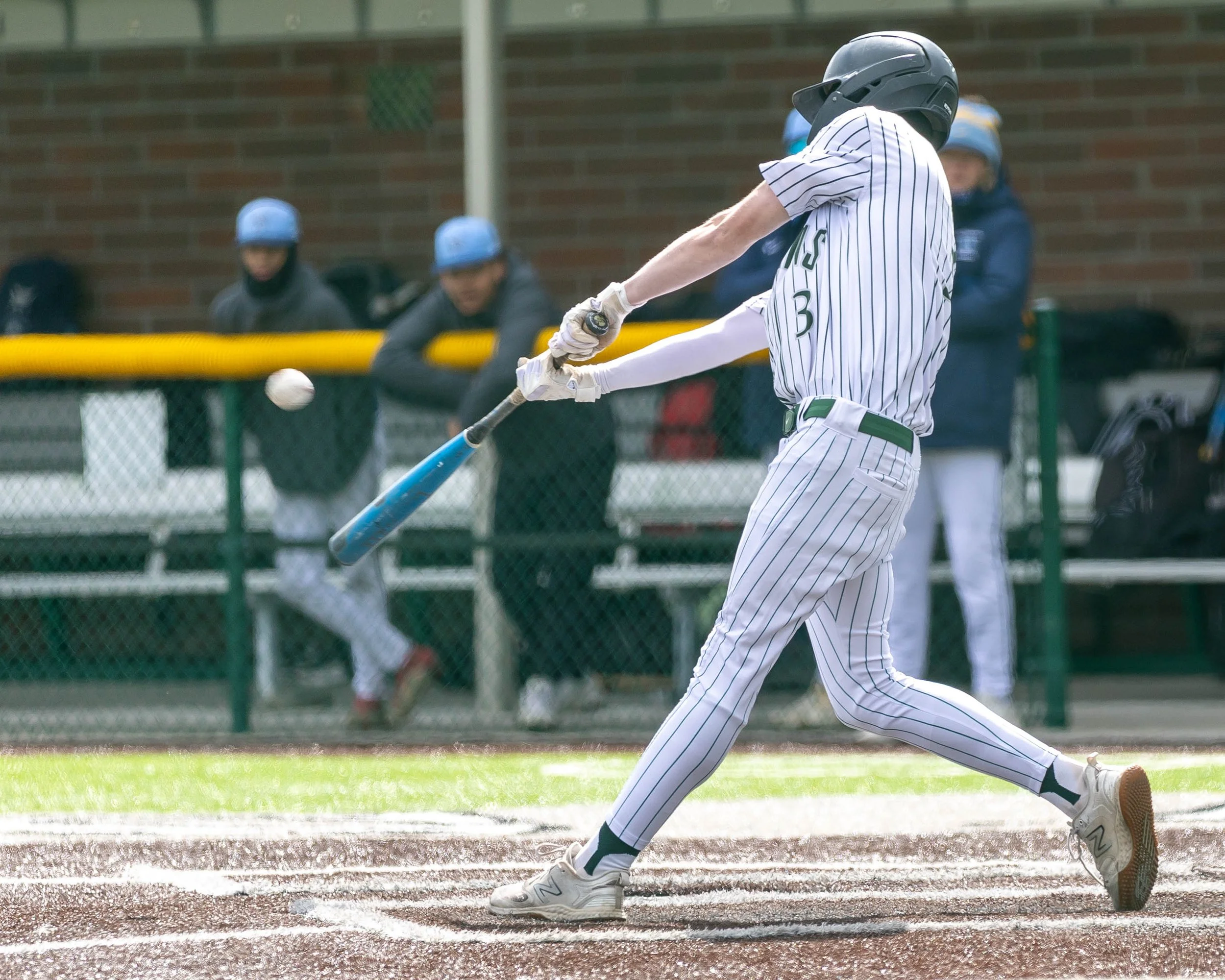 Kettering #3 hits the ball
