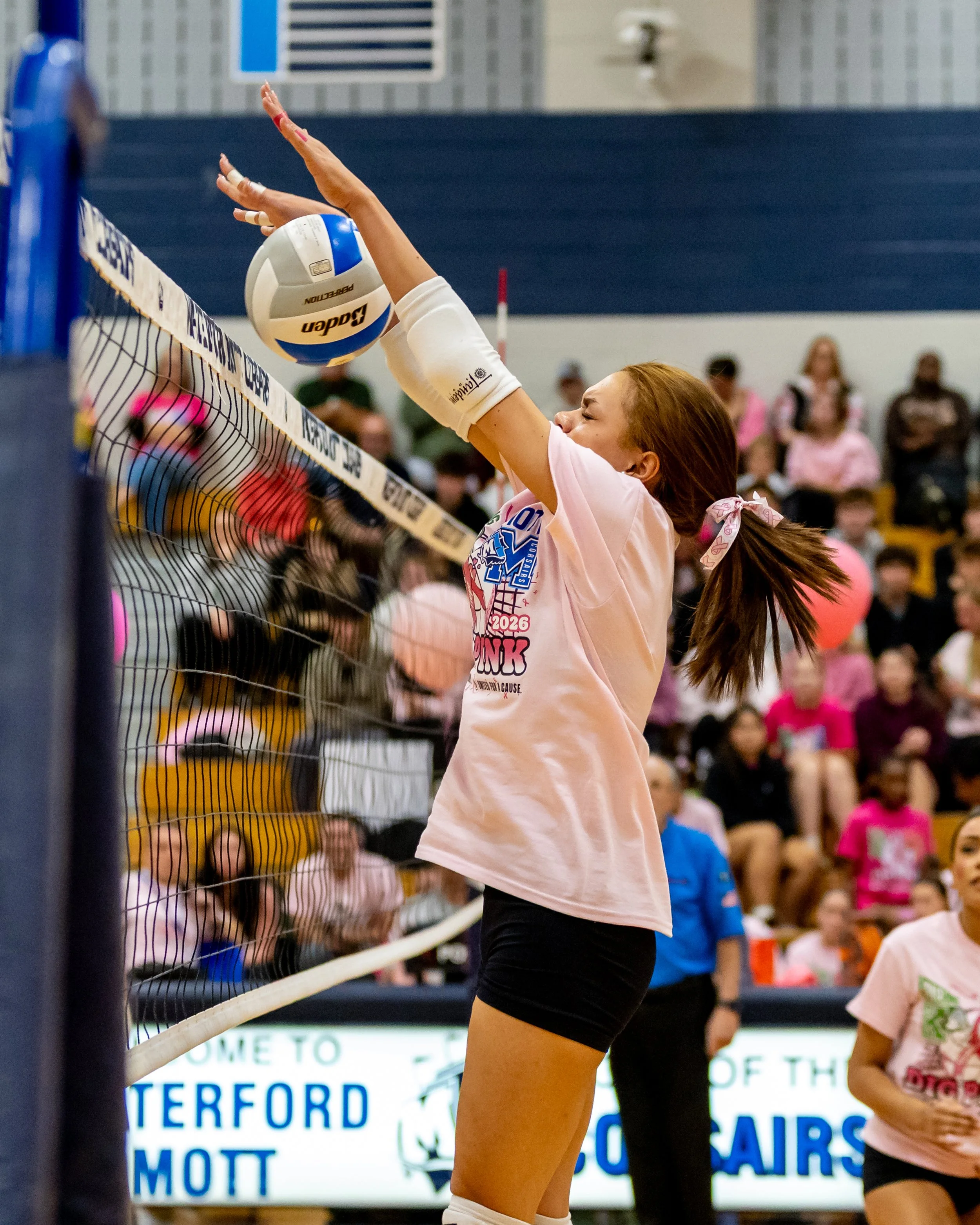 Mott player blocks the ball