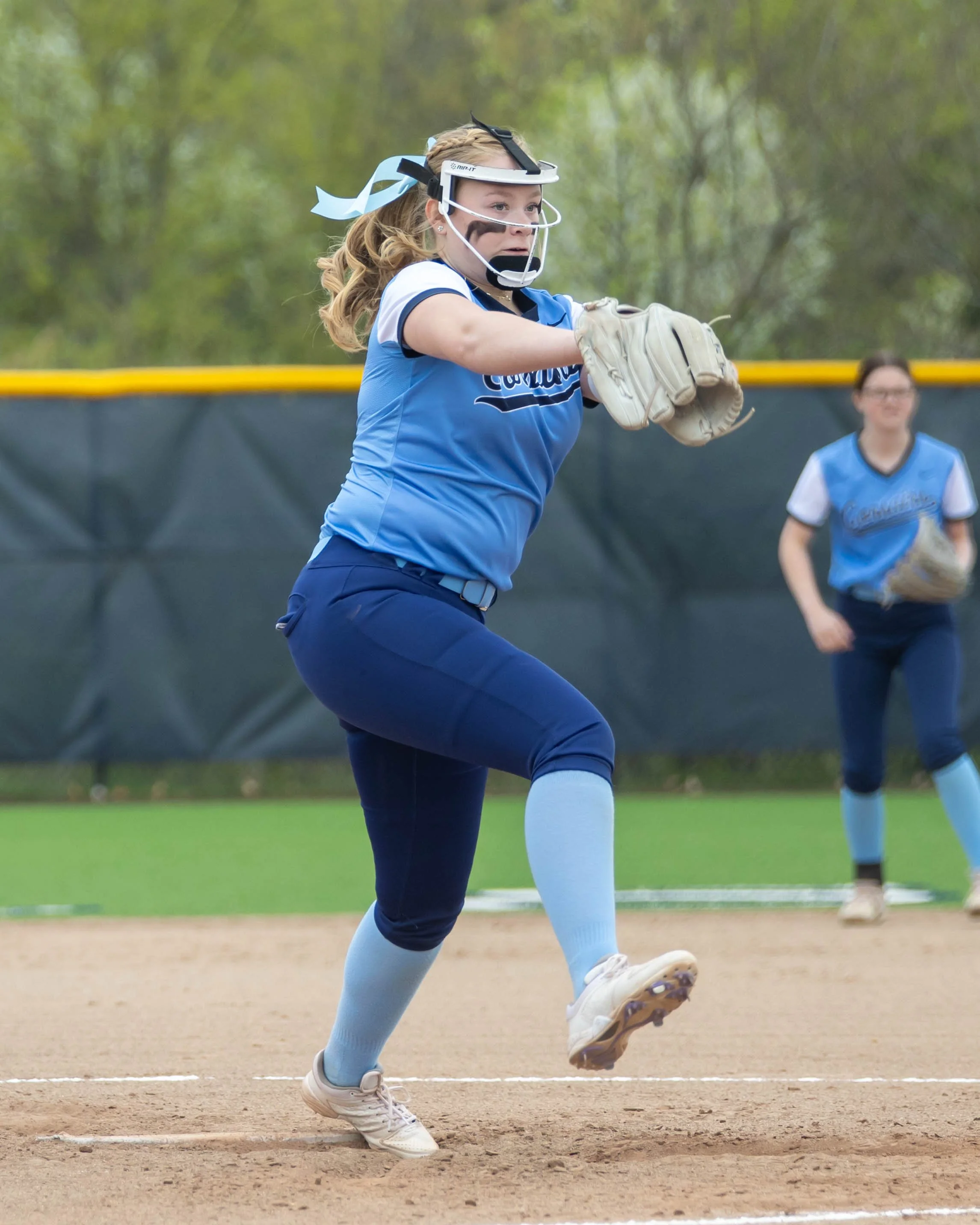 Mott #2 winds up to pitch the ball