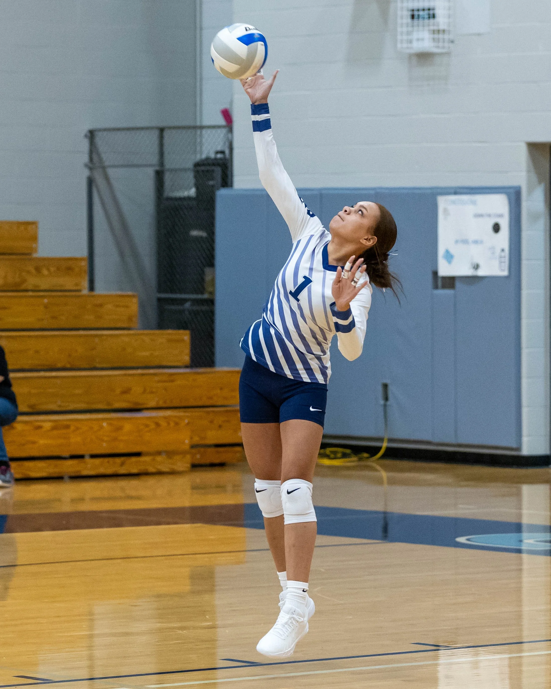 WM #1 serves the ball
