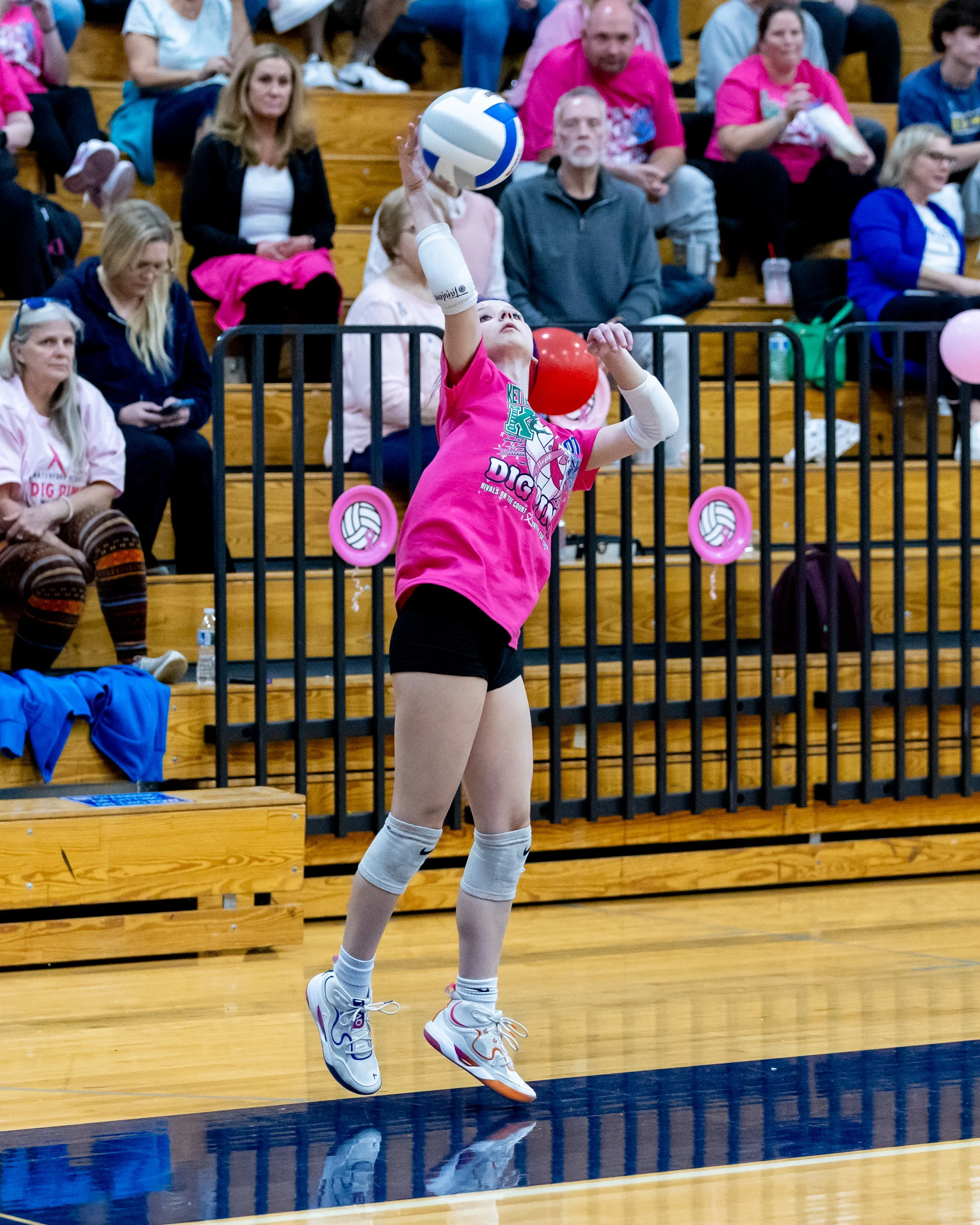 Kettering player hits the ball