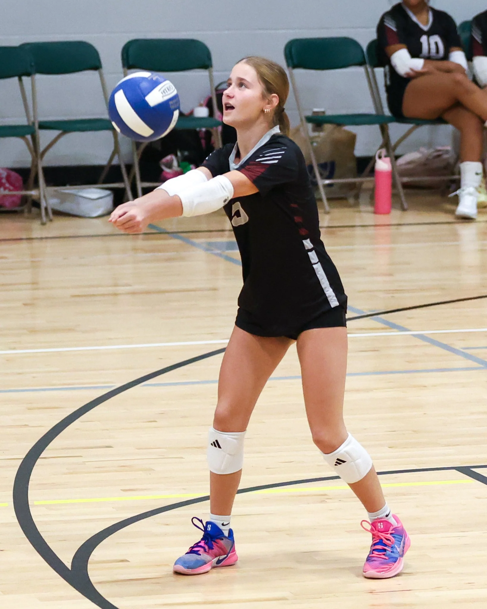 Mason girl returns the ball