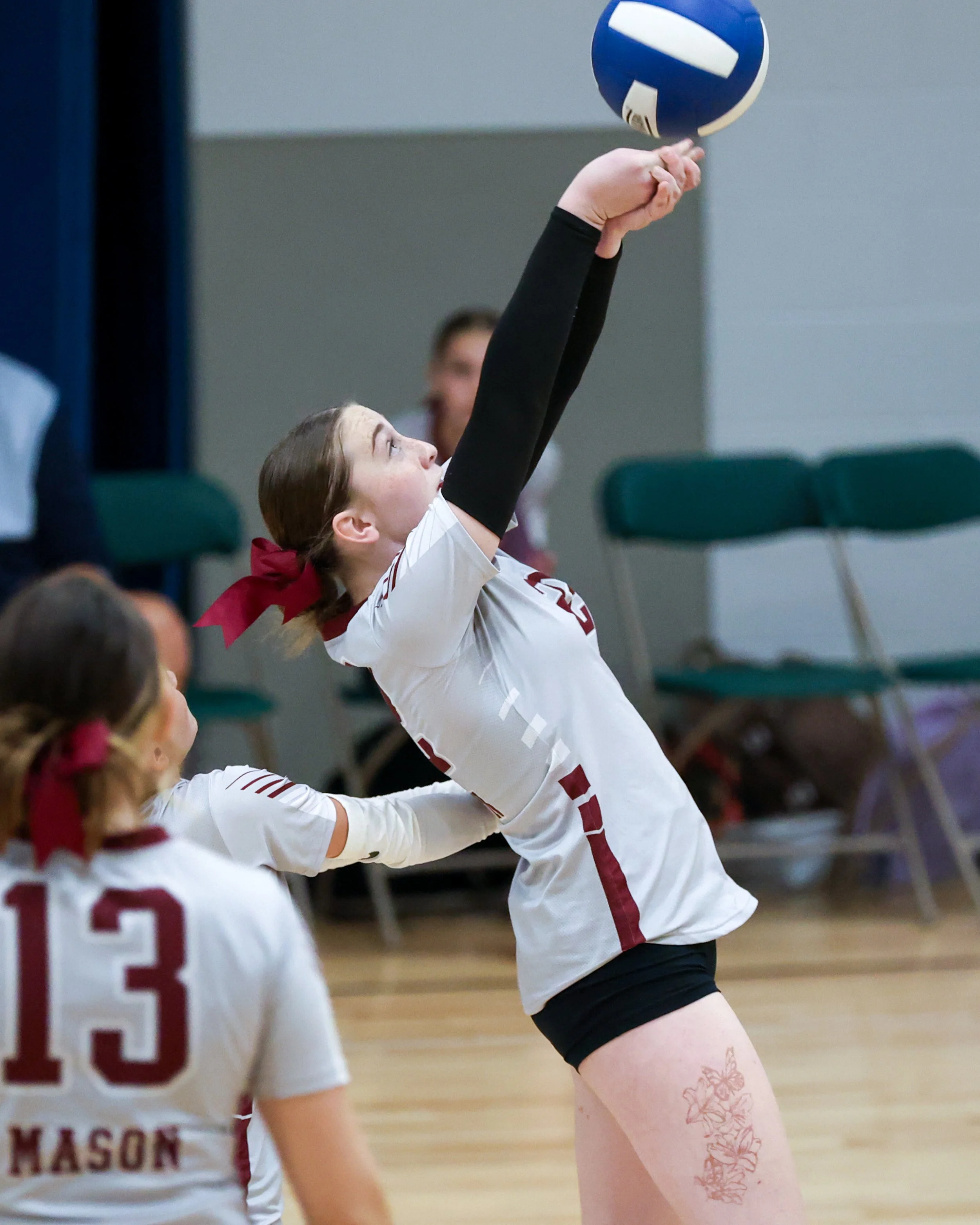 Mason girl returns the ball