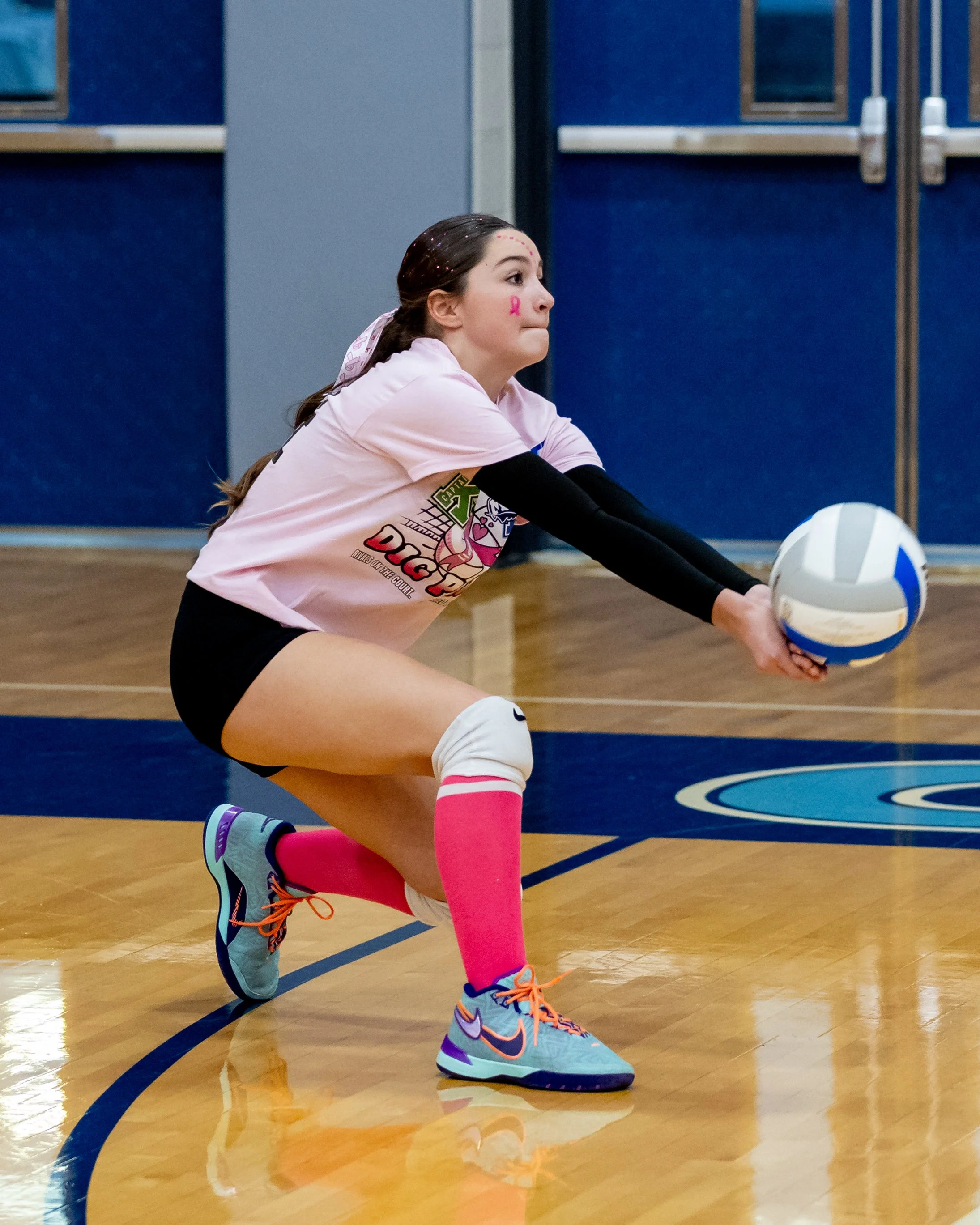 Mott player hits the ball