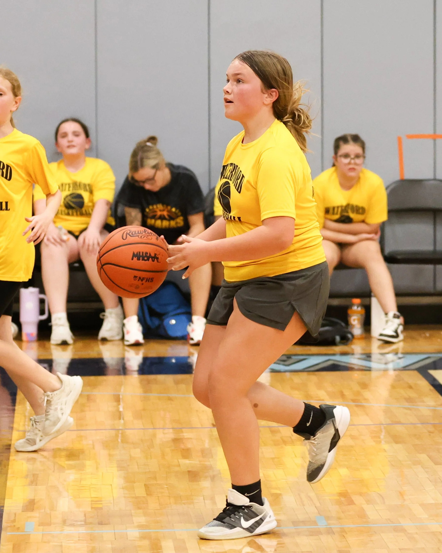 Schoolcraft girl holds the ball