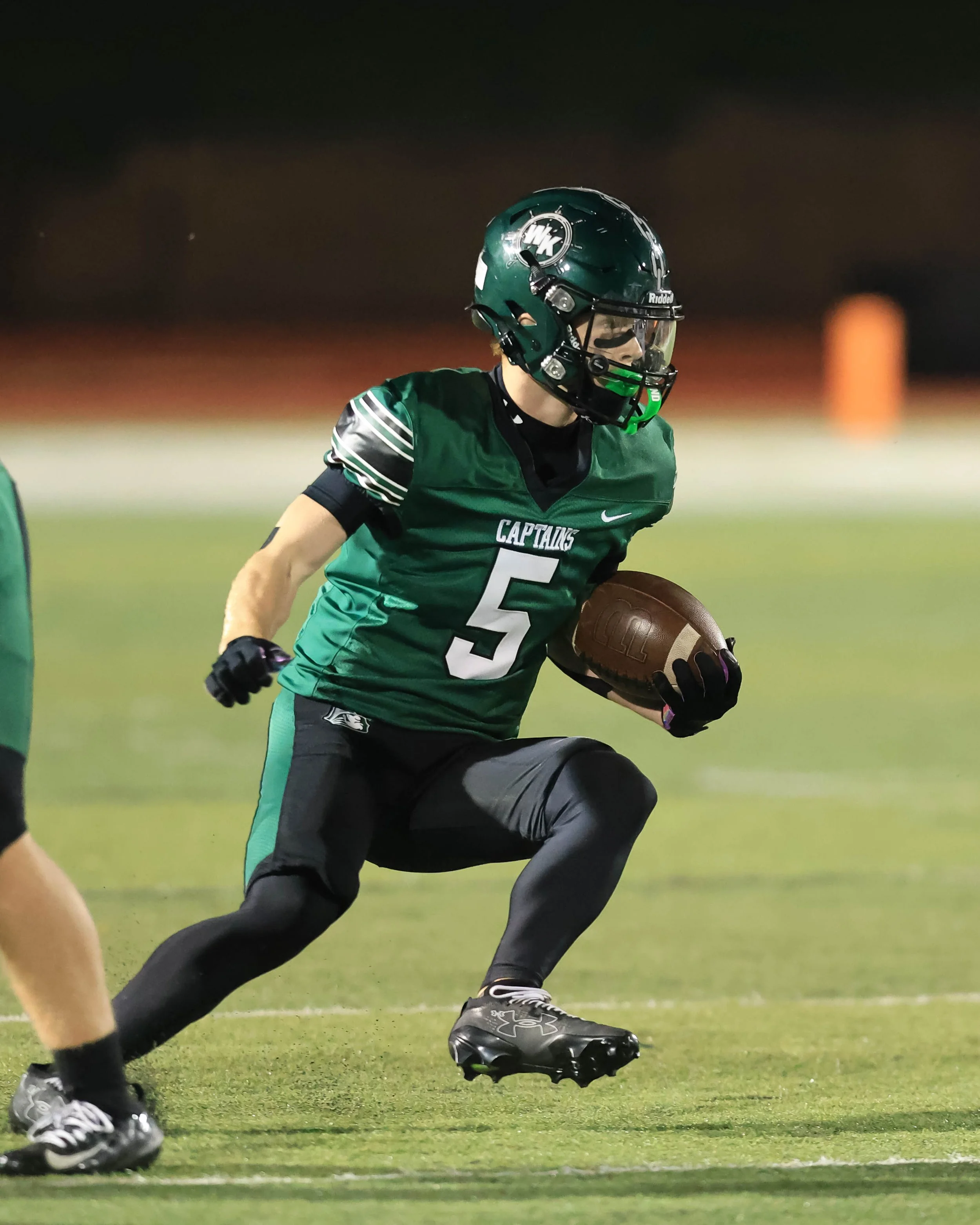 WK #5 carries the ball