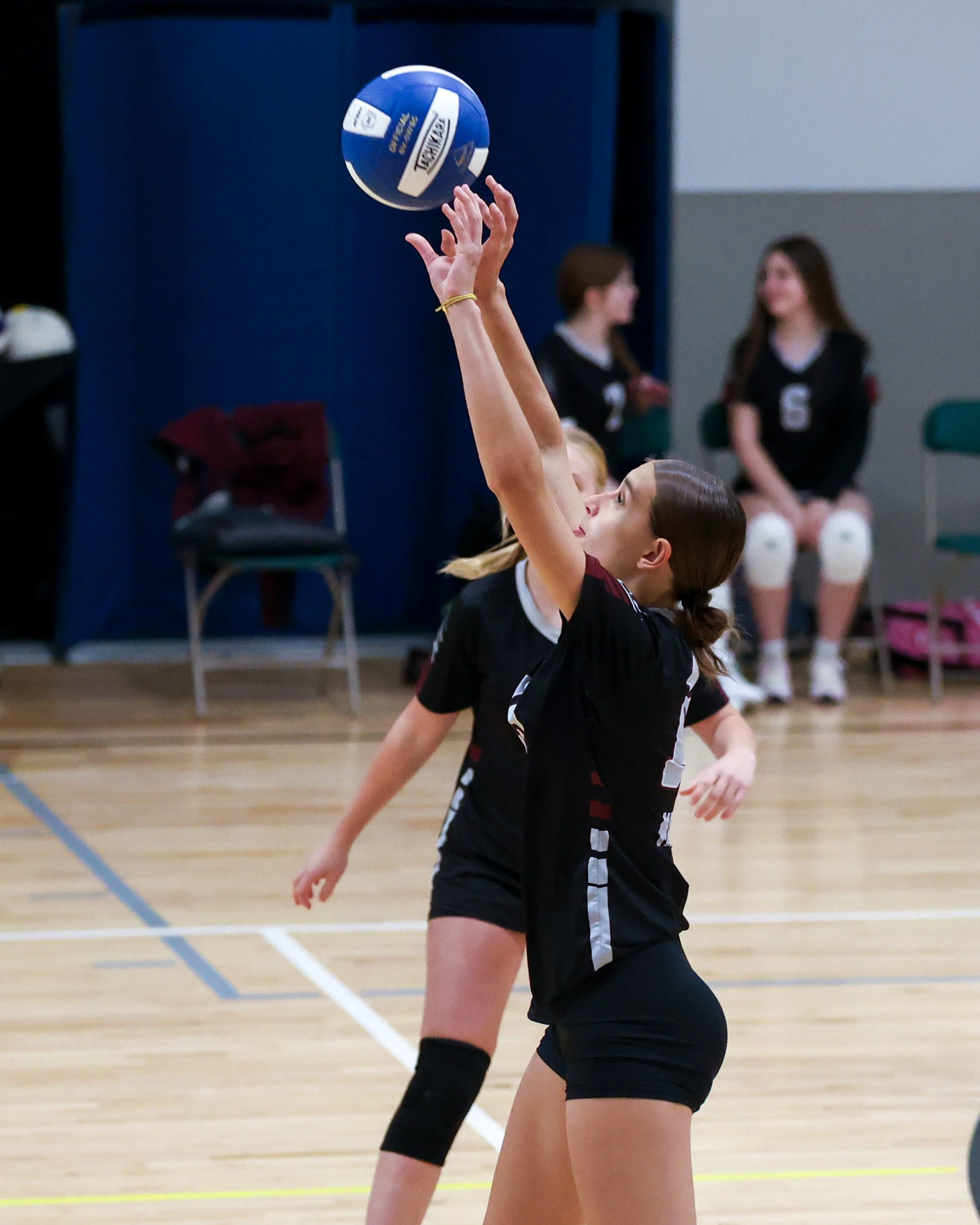 Mason girl returns the ball