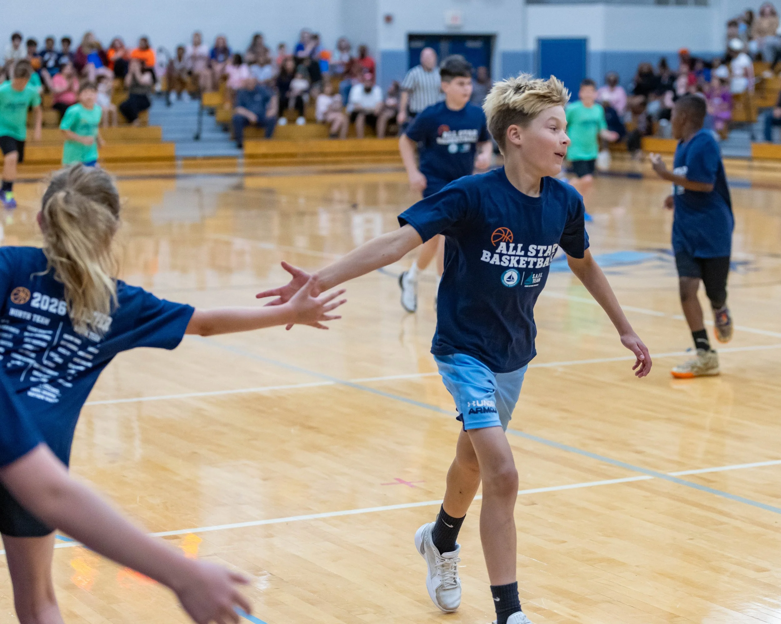High-five from the North bench