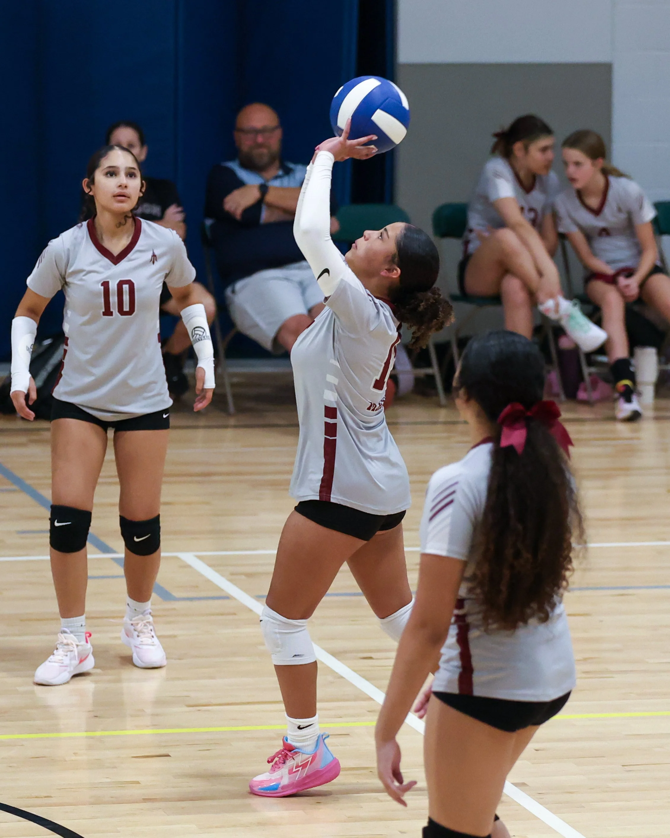 Mason girl returns the ball