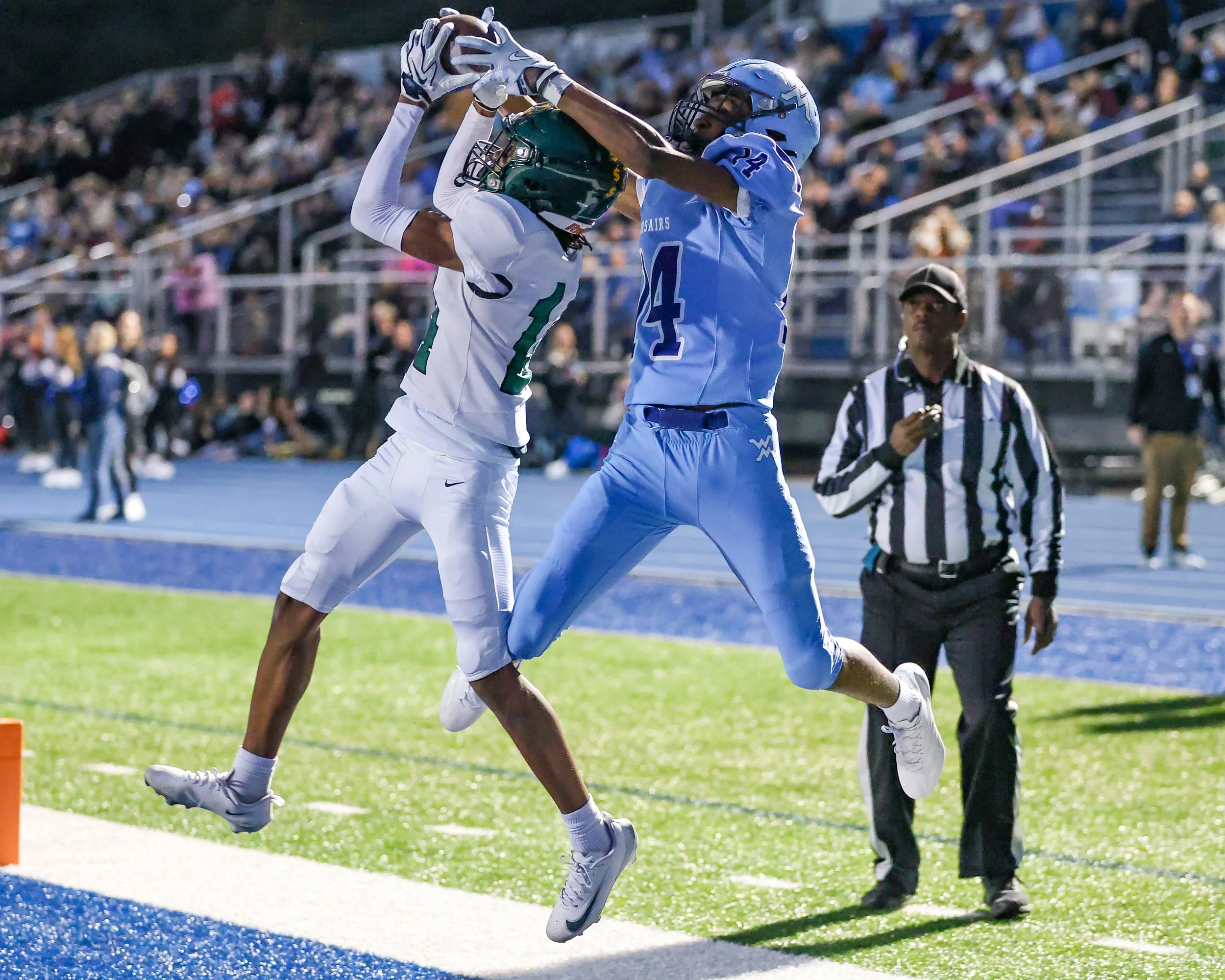 Mott #14 goes for the ball 