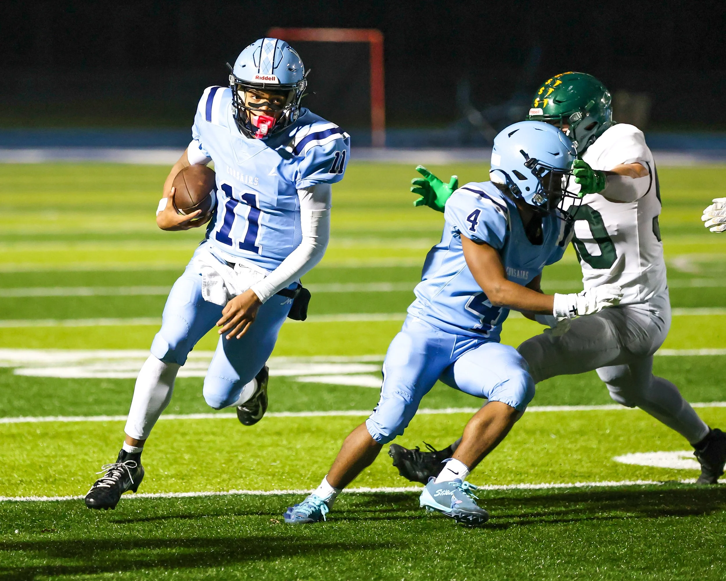 Mott #11 runs with the ball