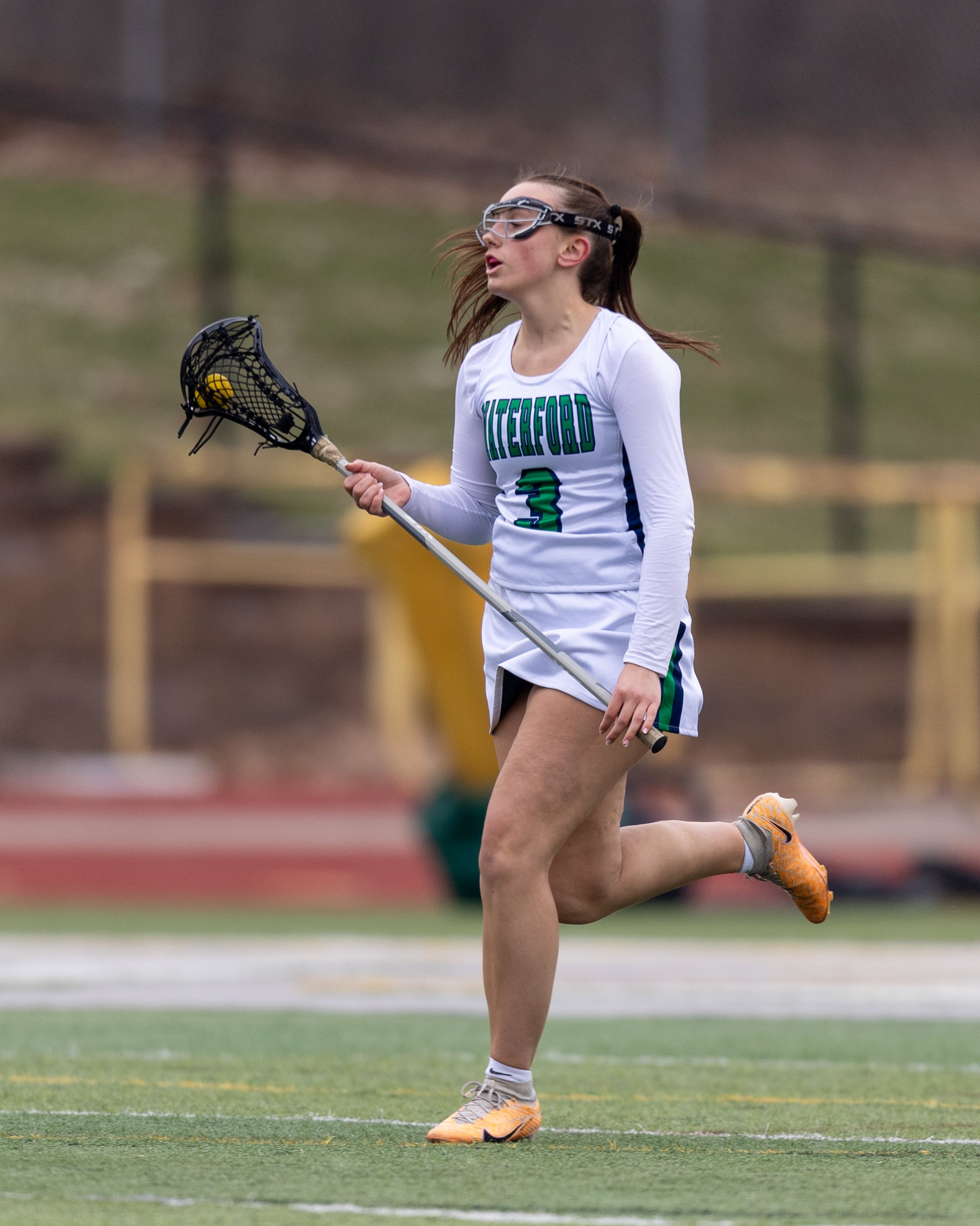 #3 carries the down the field