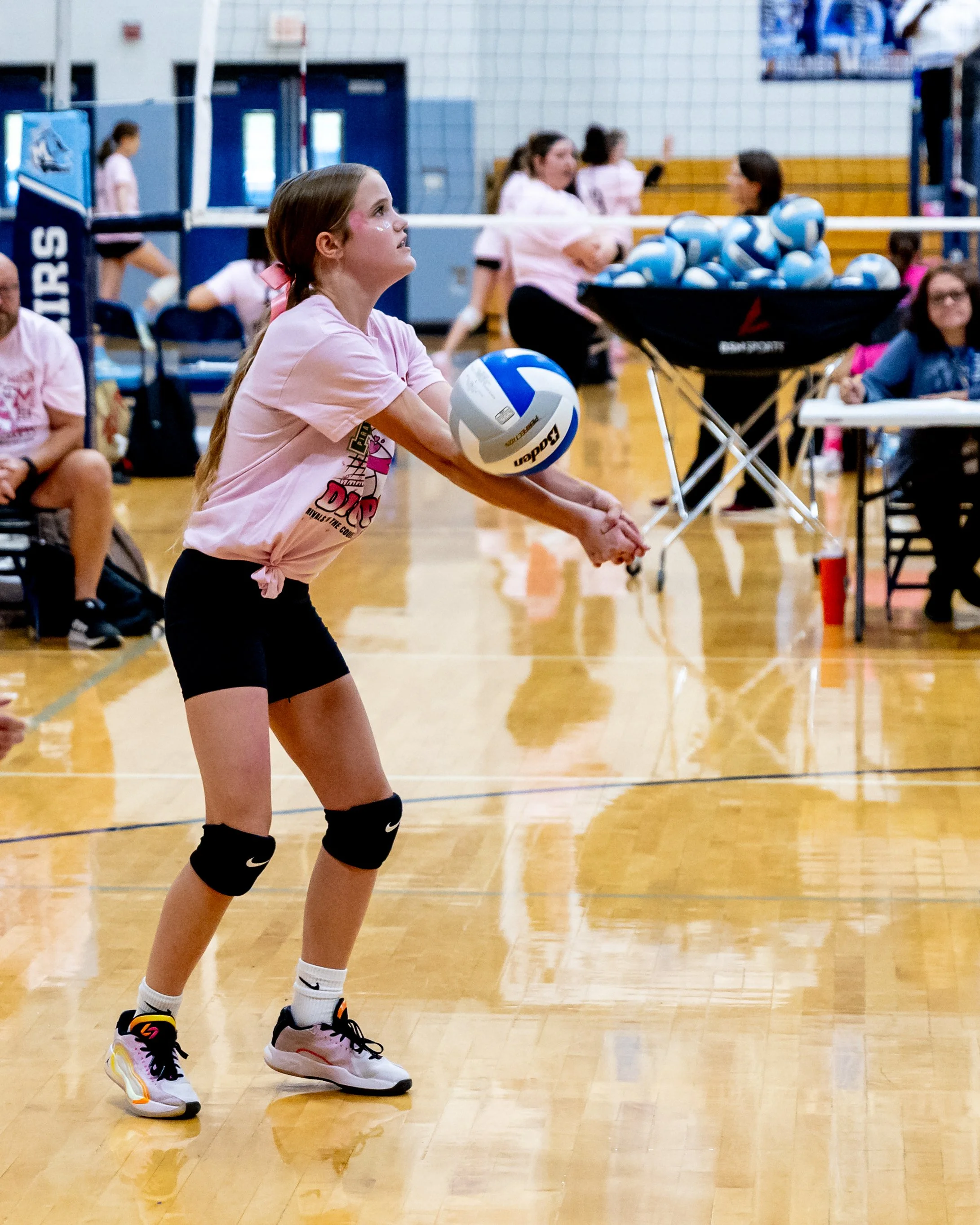 Mason player hits the ball