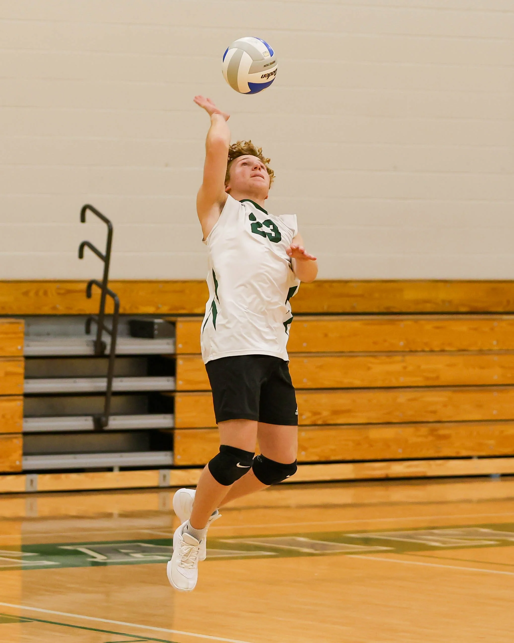 Kettering #18 serves the ball