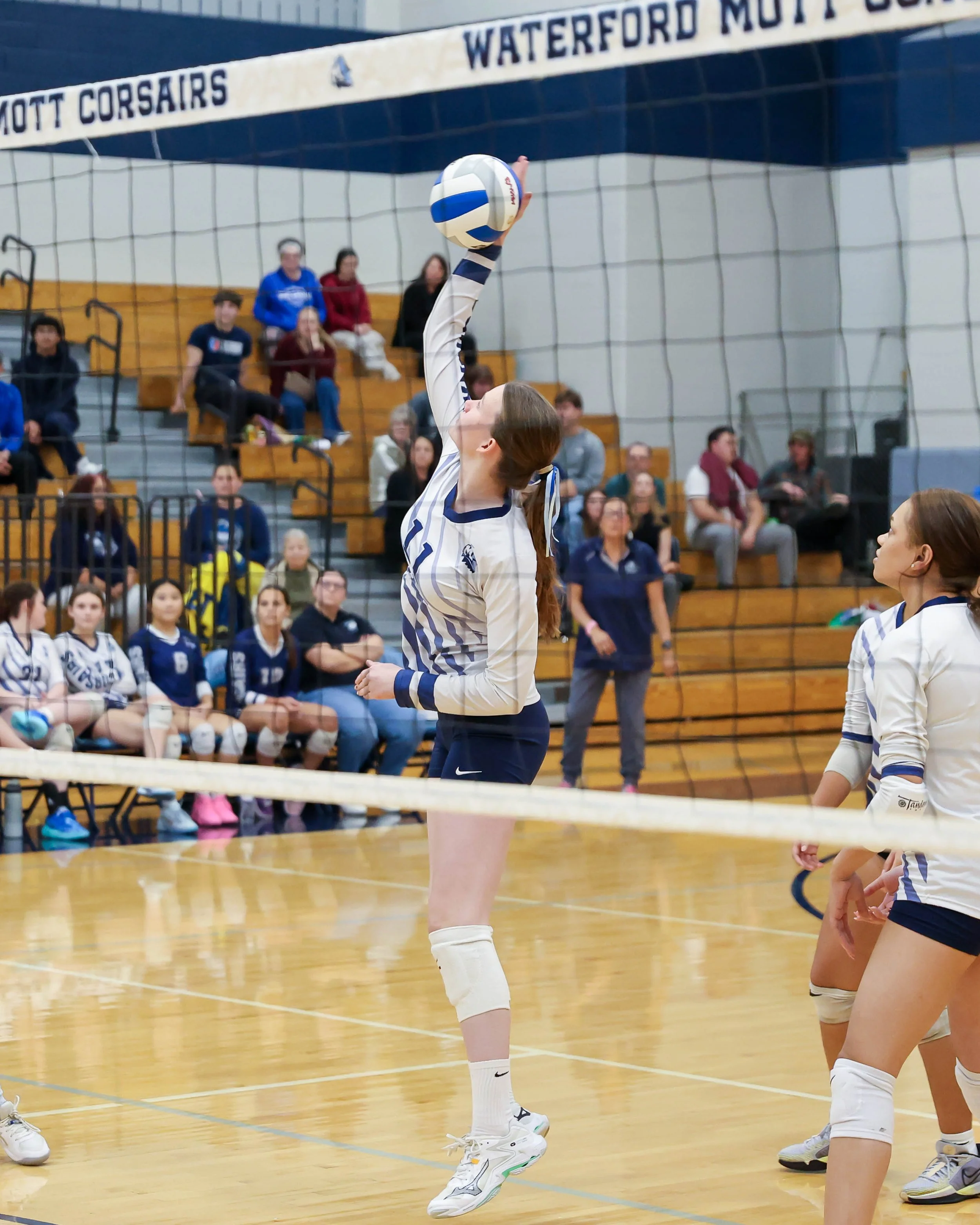 Mott #11 returns the ball