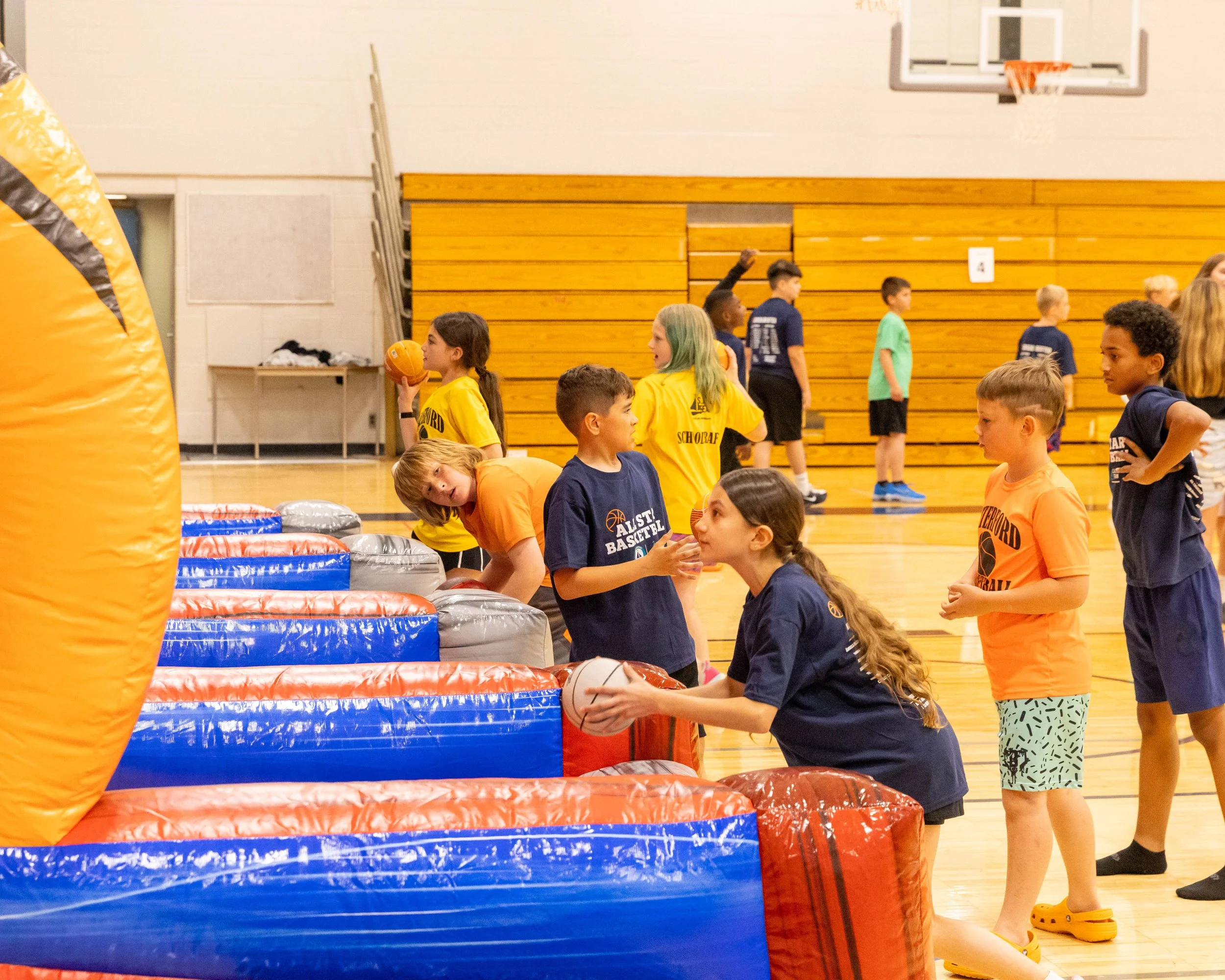Kids at the blowup games