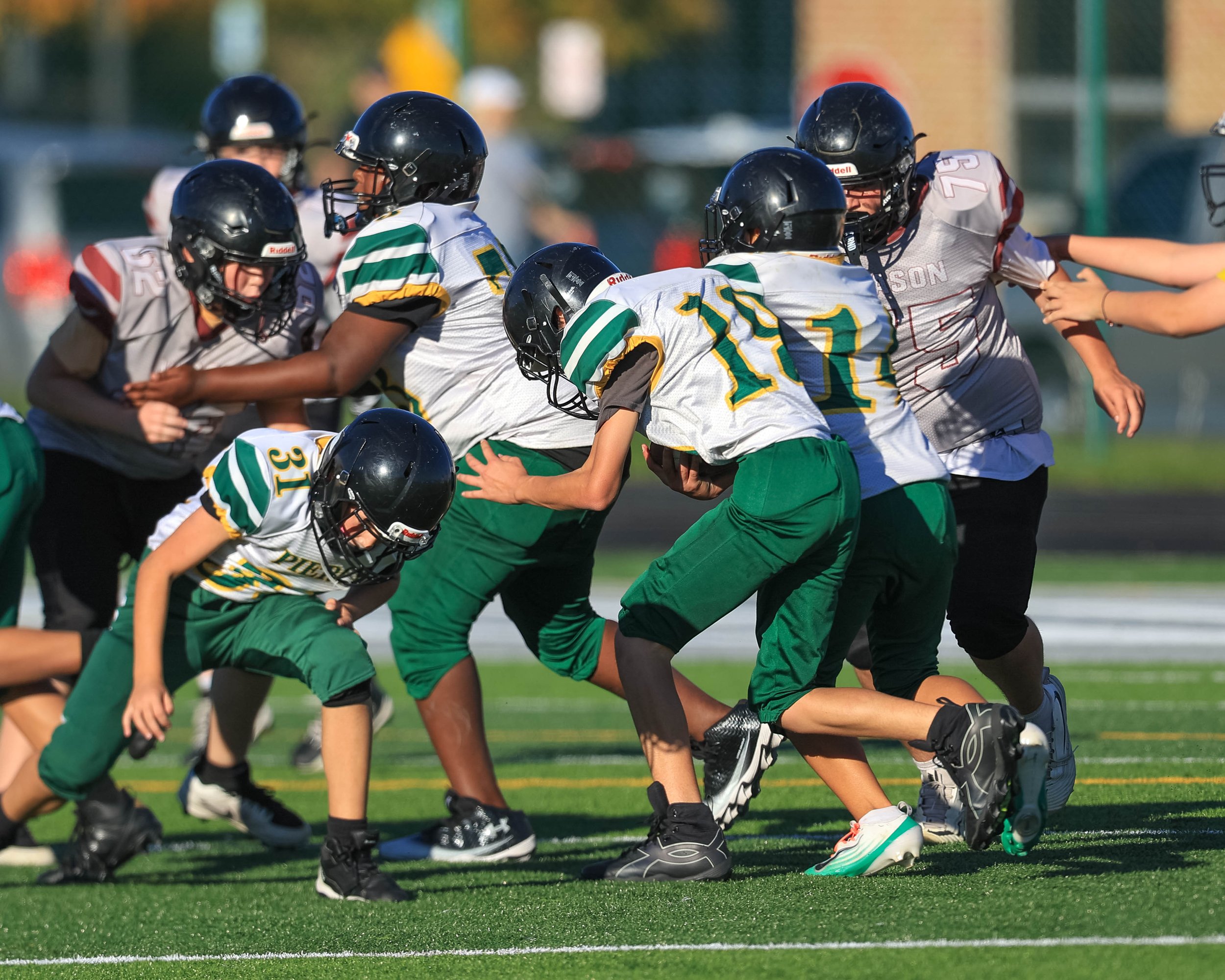 Pierce #19 carries the ball