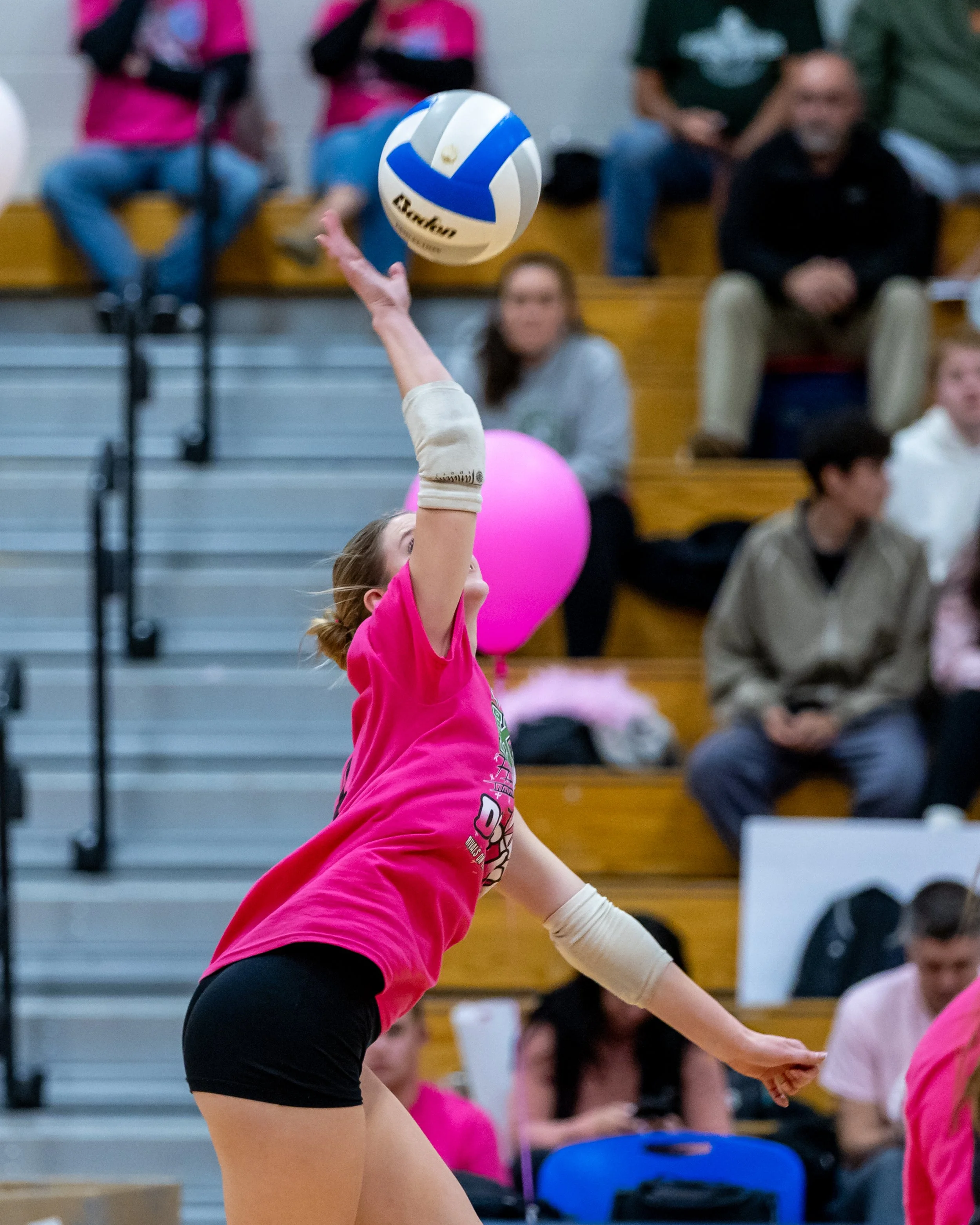 Kettering player hits the ball