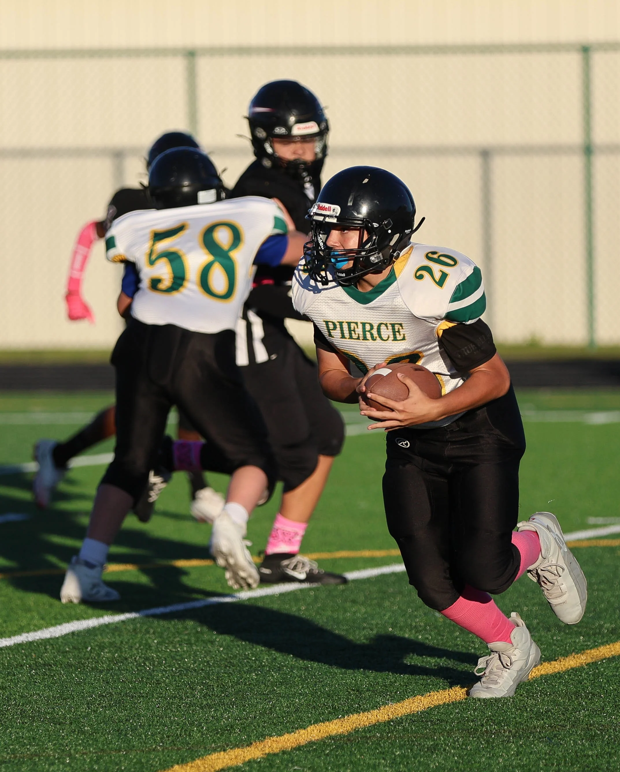 Pierce #26 with the ball