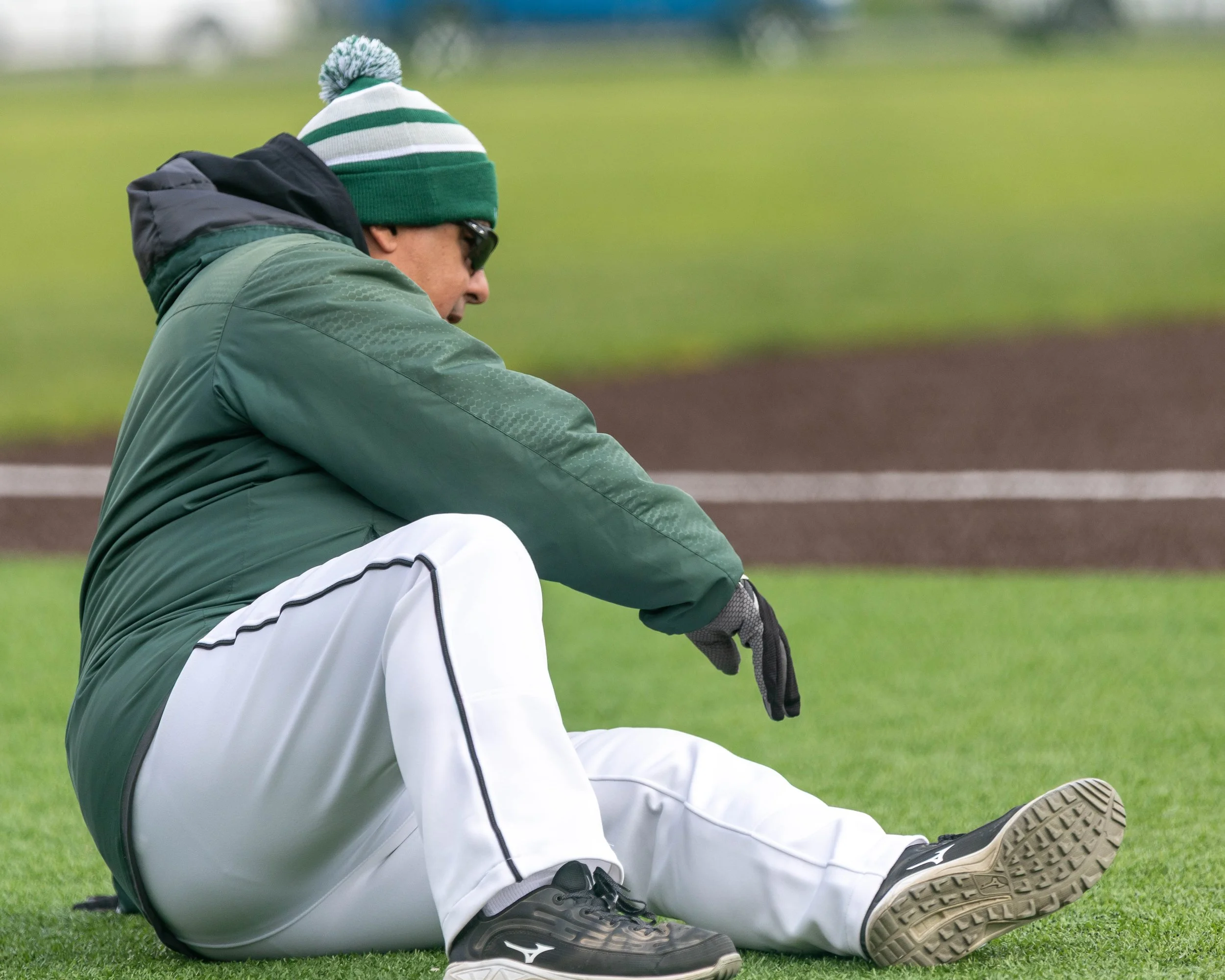 Kettering coach takes a tumble after line shot at him