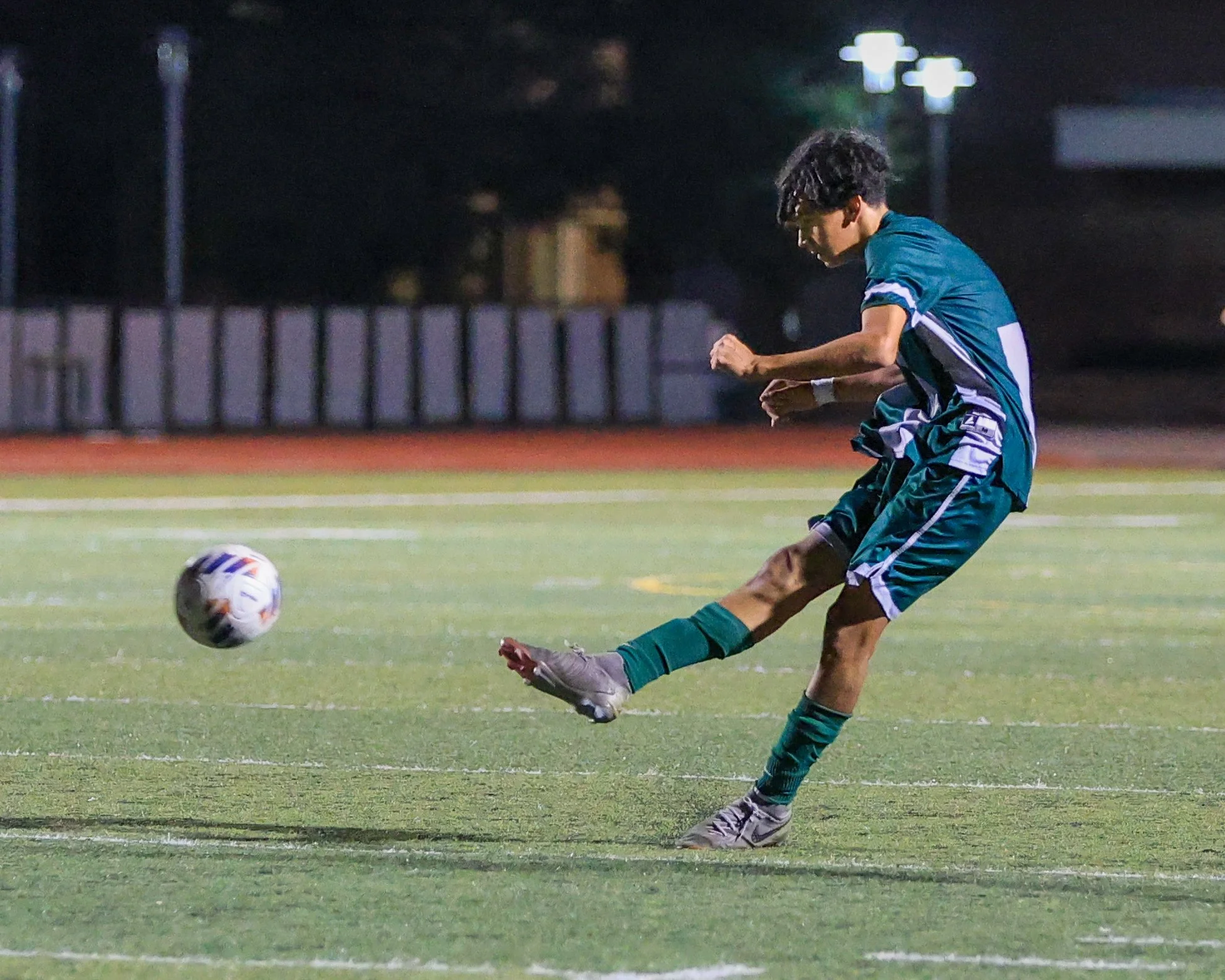 WK #6 kicks the ball