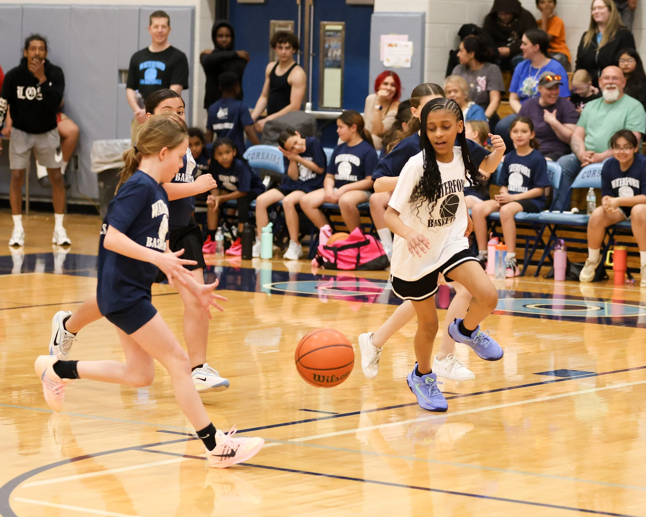 Beaumont and Donelson Hills girls look at the loose ball 