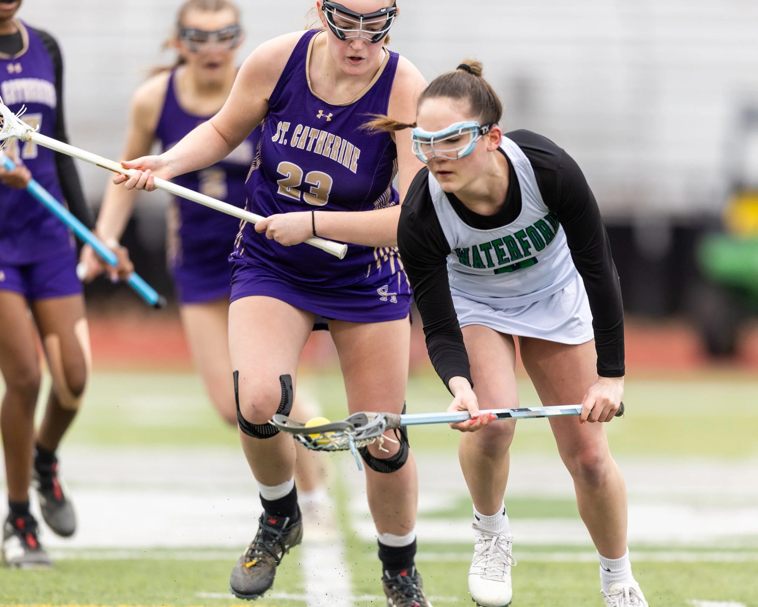 #5 picks the ball up off the ground