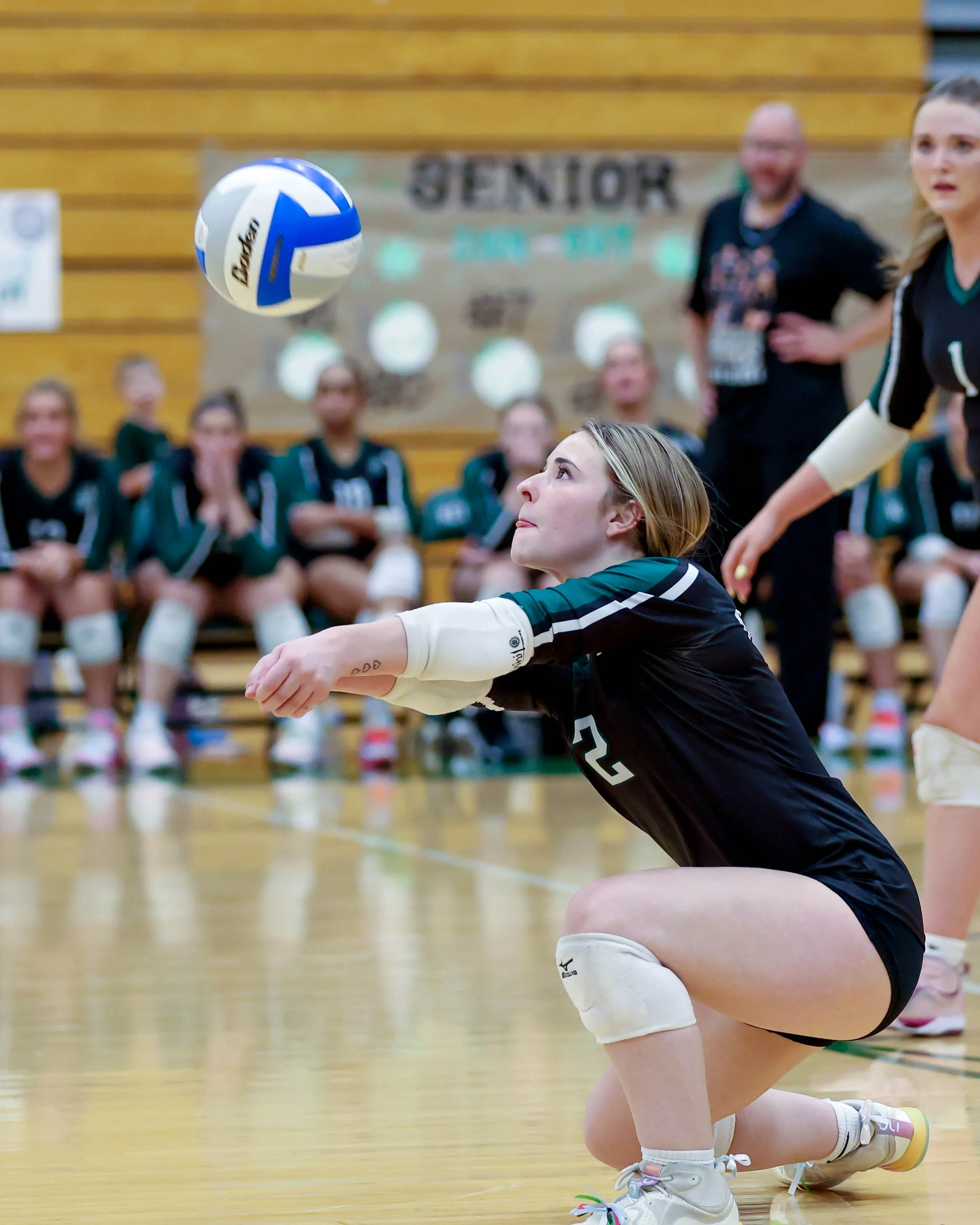 Kettering #2 waits for the ball