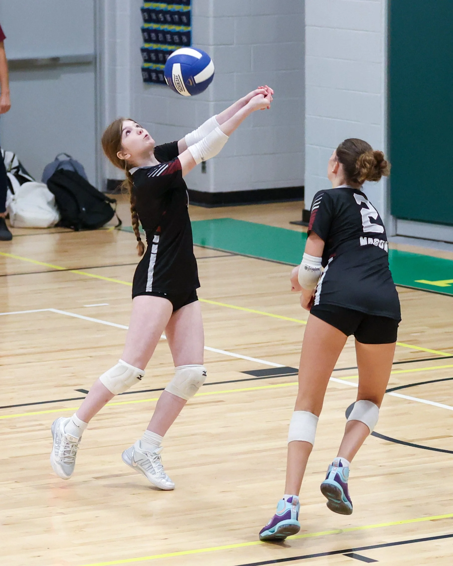 Mason girl returns the ball