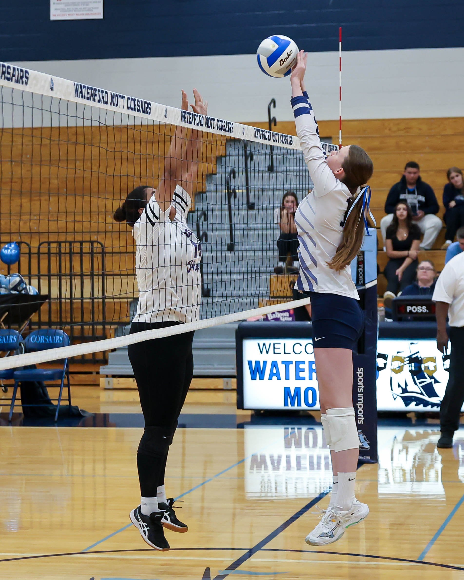 Mott #11 blocks the ball