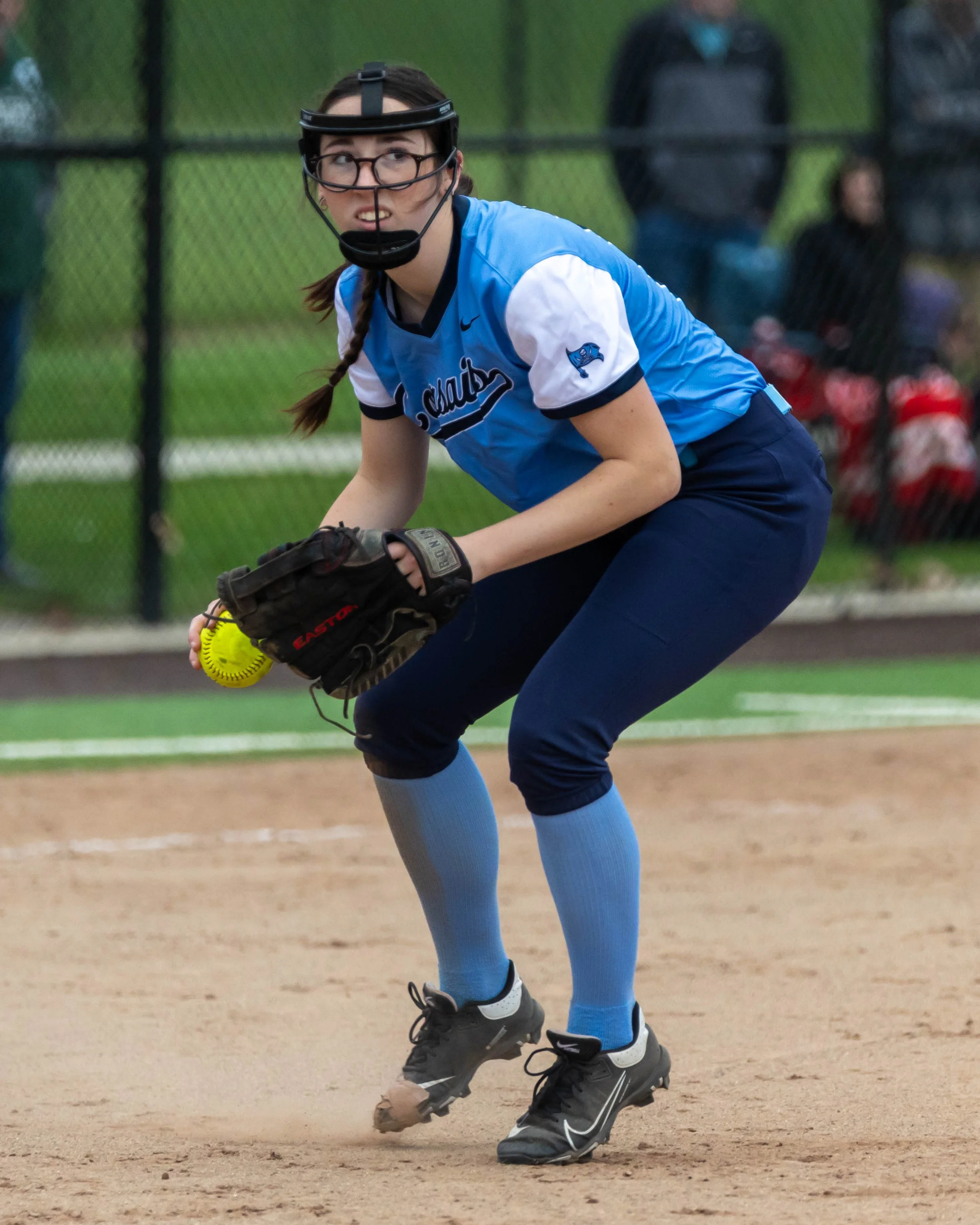 Mott pitcher ready to throw to first base