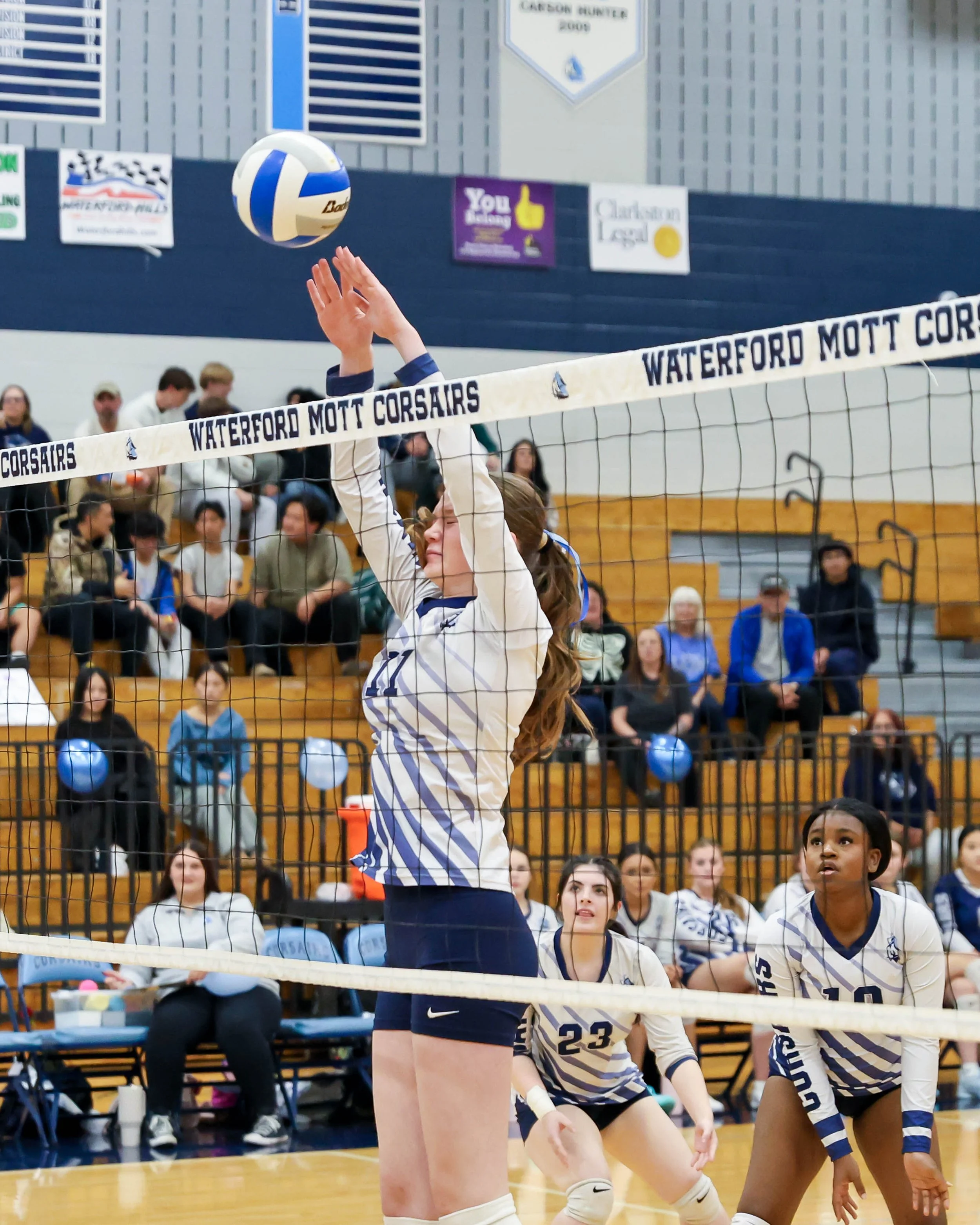 Mott #11 up to block the ball 