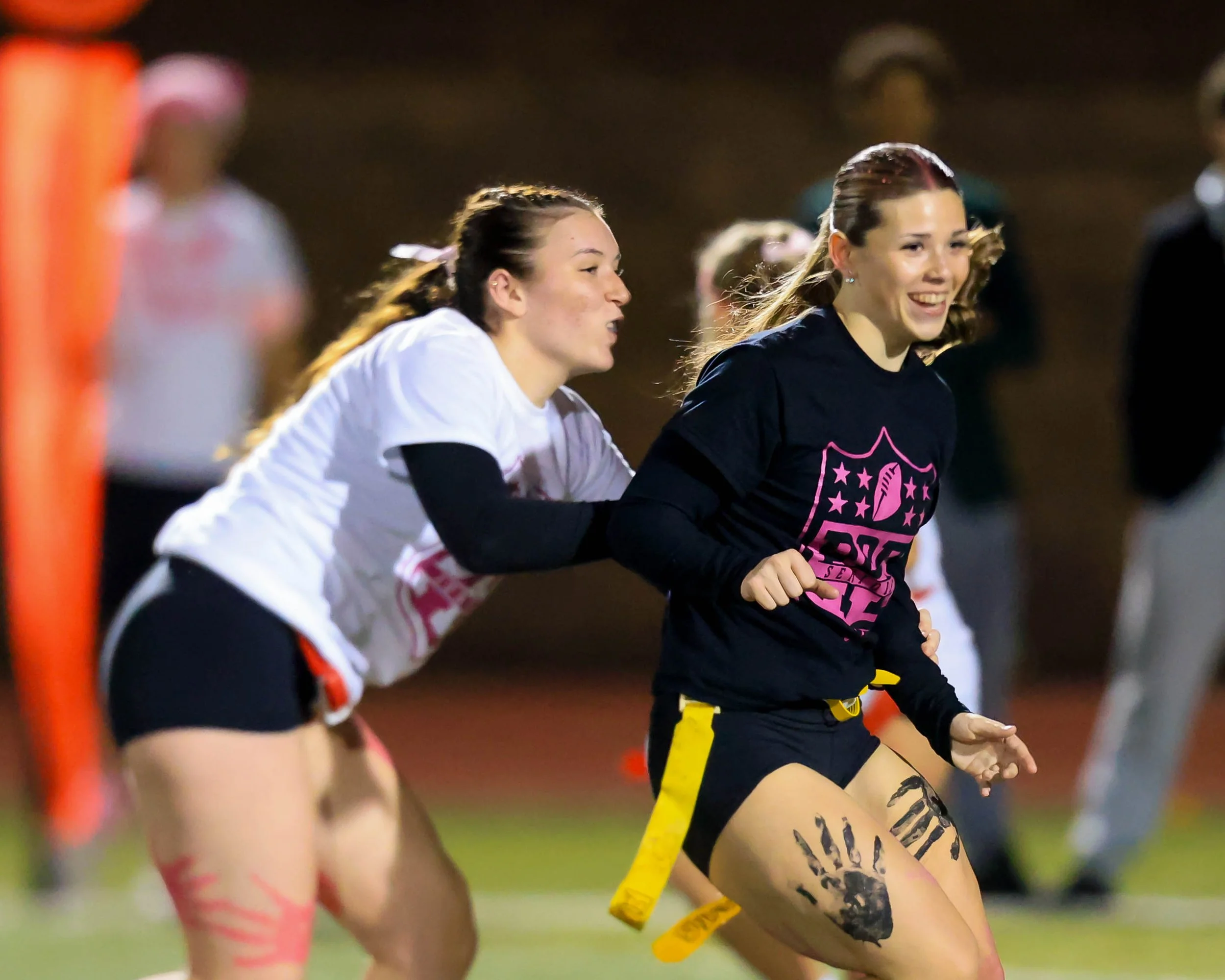 Junior blocks a Senior defender