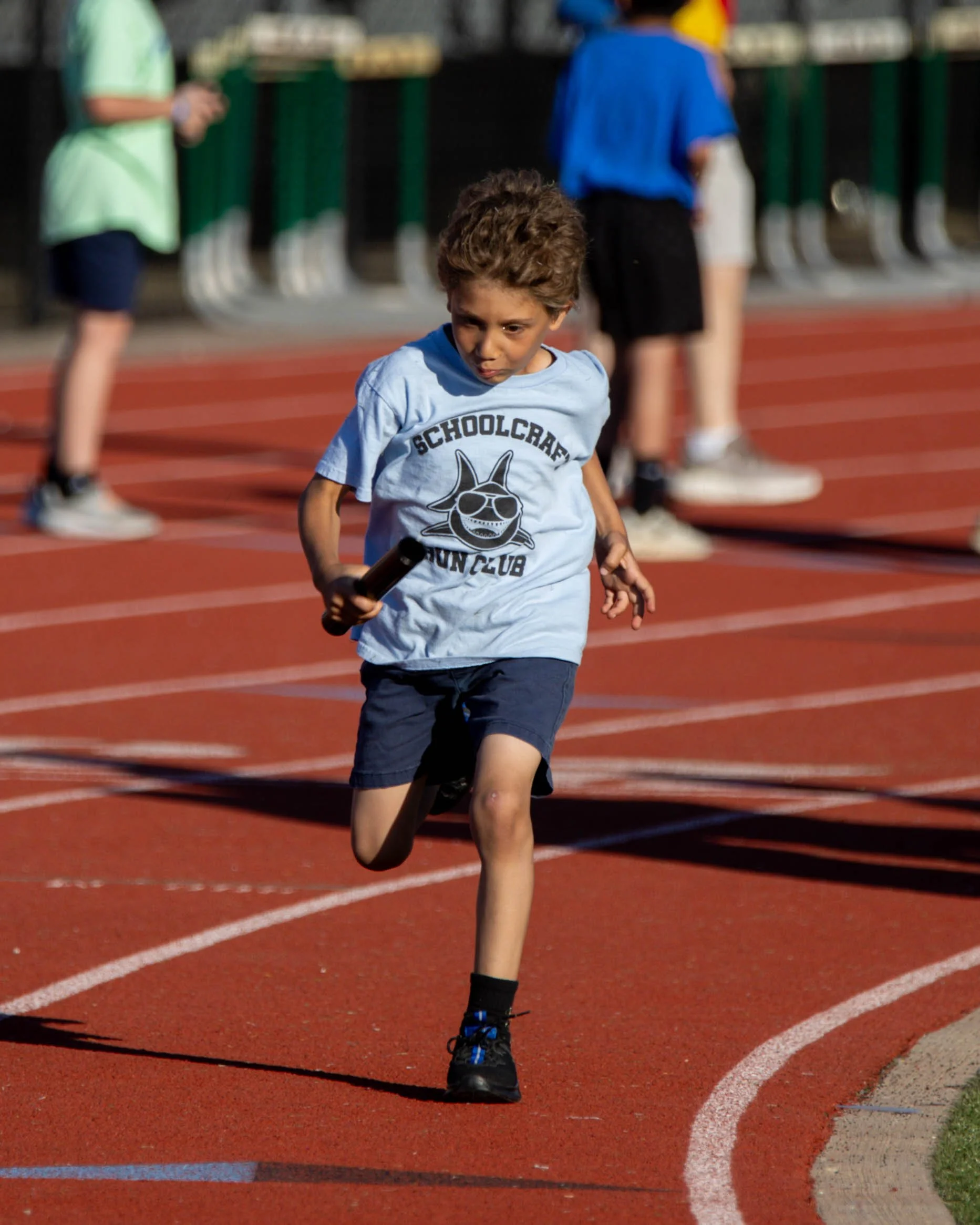 Schoolcraft runner after the exchange