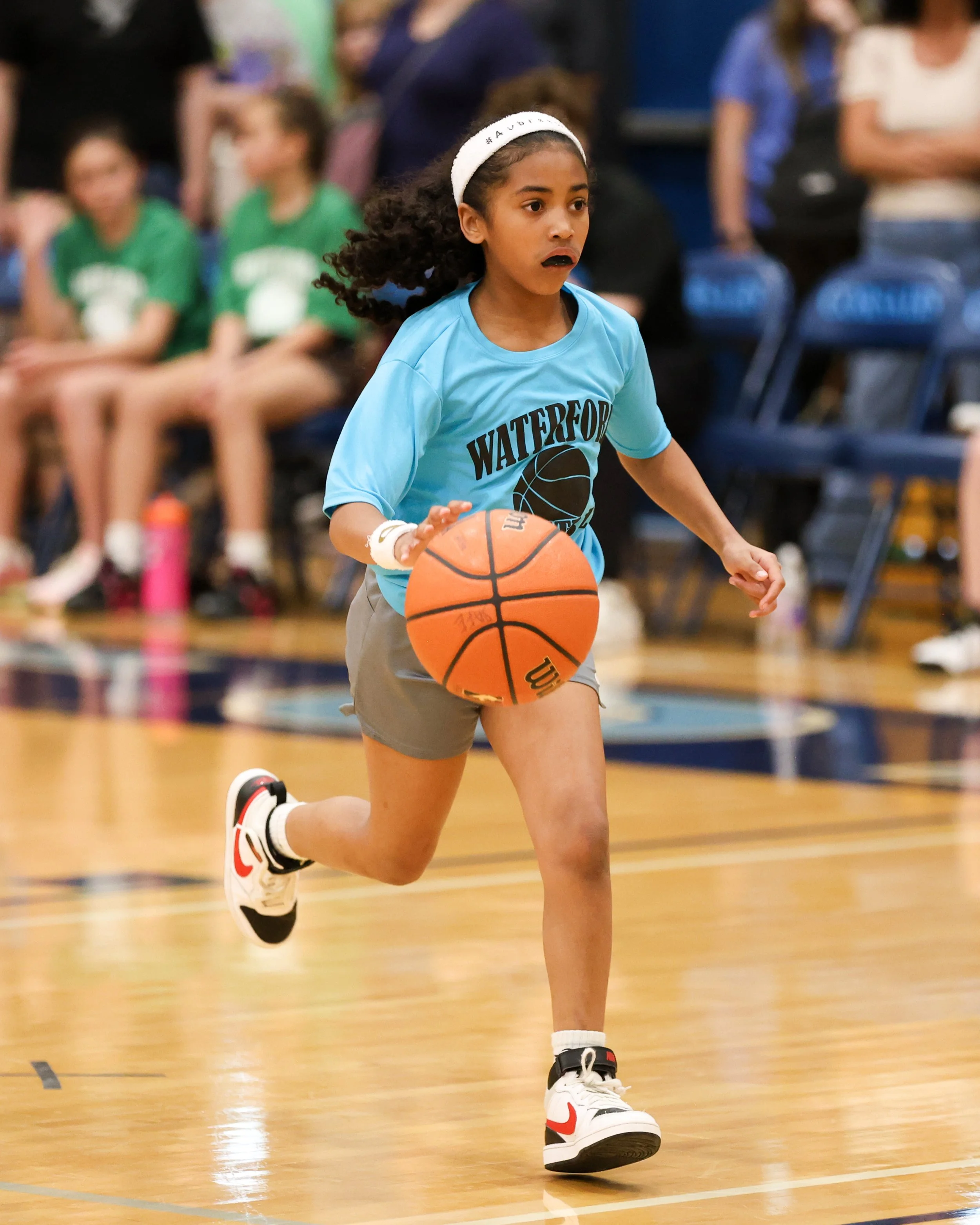 Cooley girl dribbles the ball 