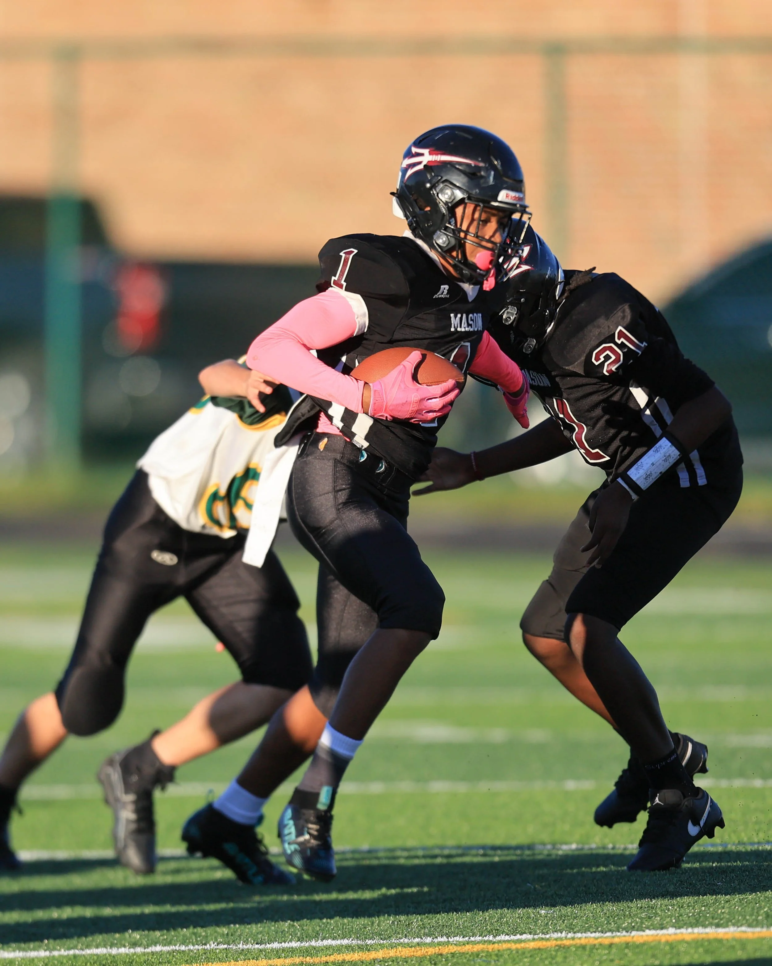 Mason #1 runs with the ball
