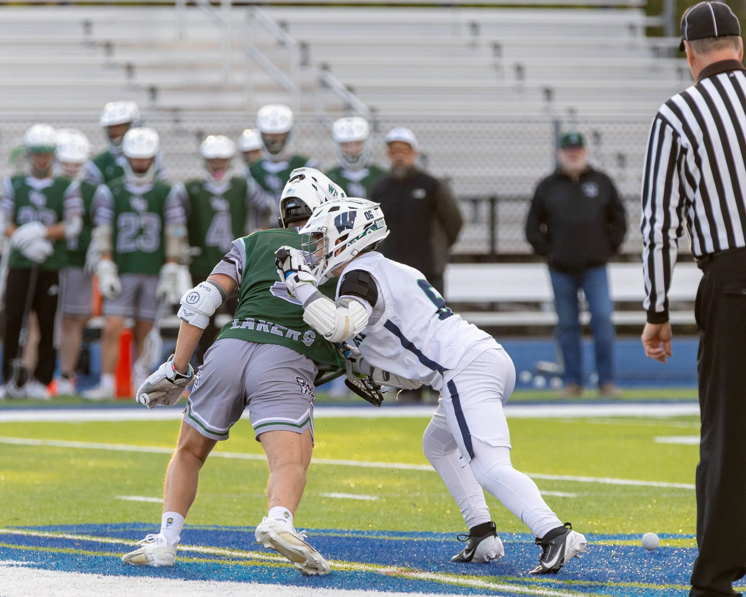 Waterford United player faces off with a West Bloomfield player