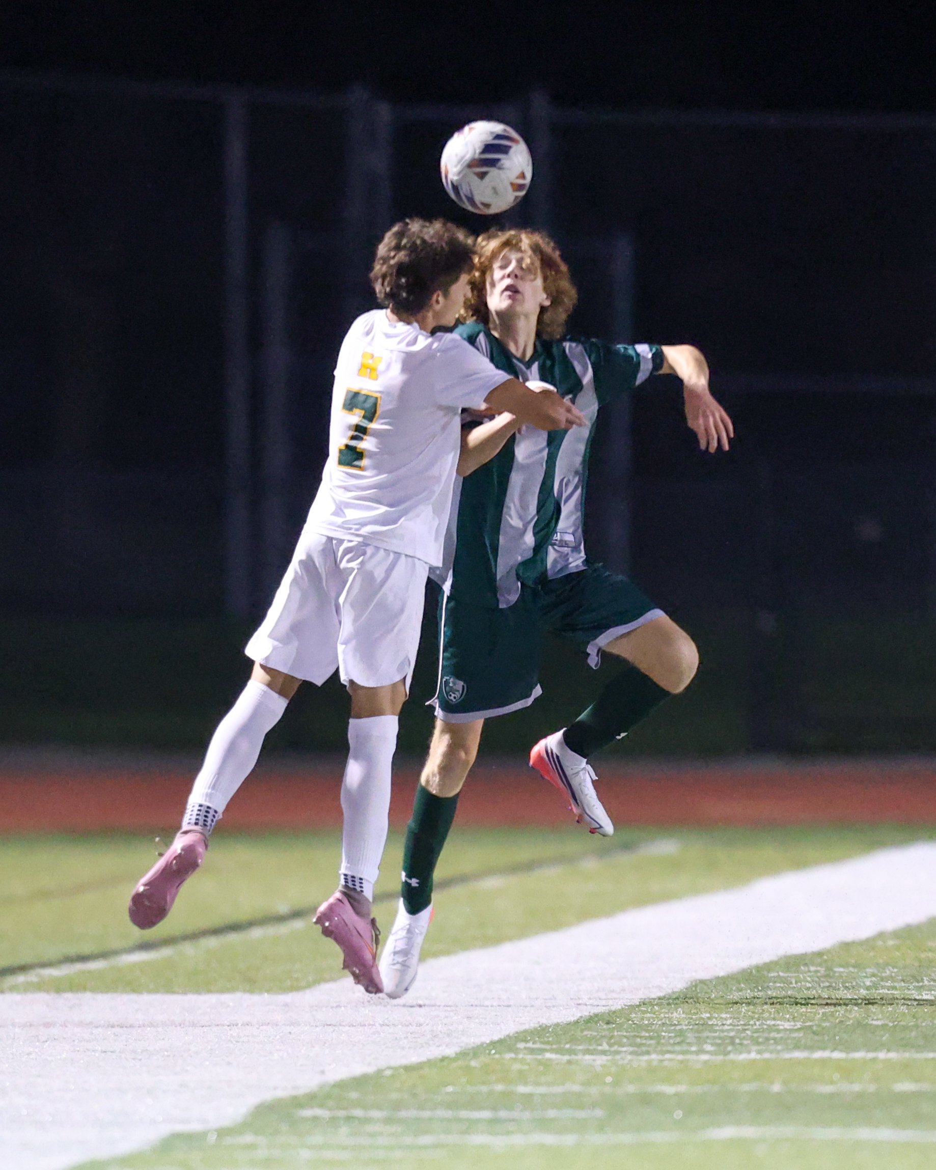 WK #36 heads the ball