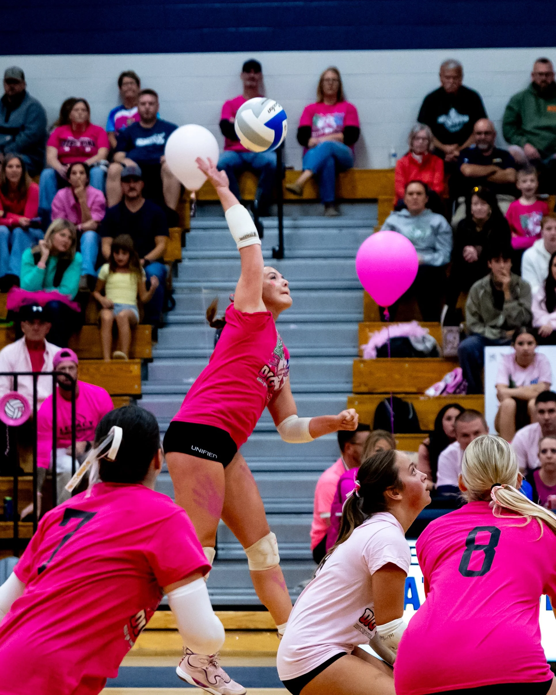 Kettering player hits the ball