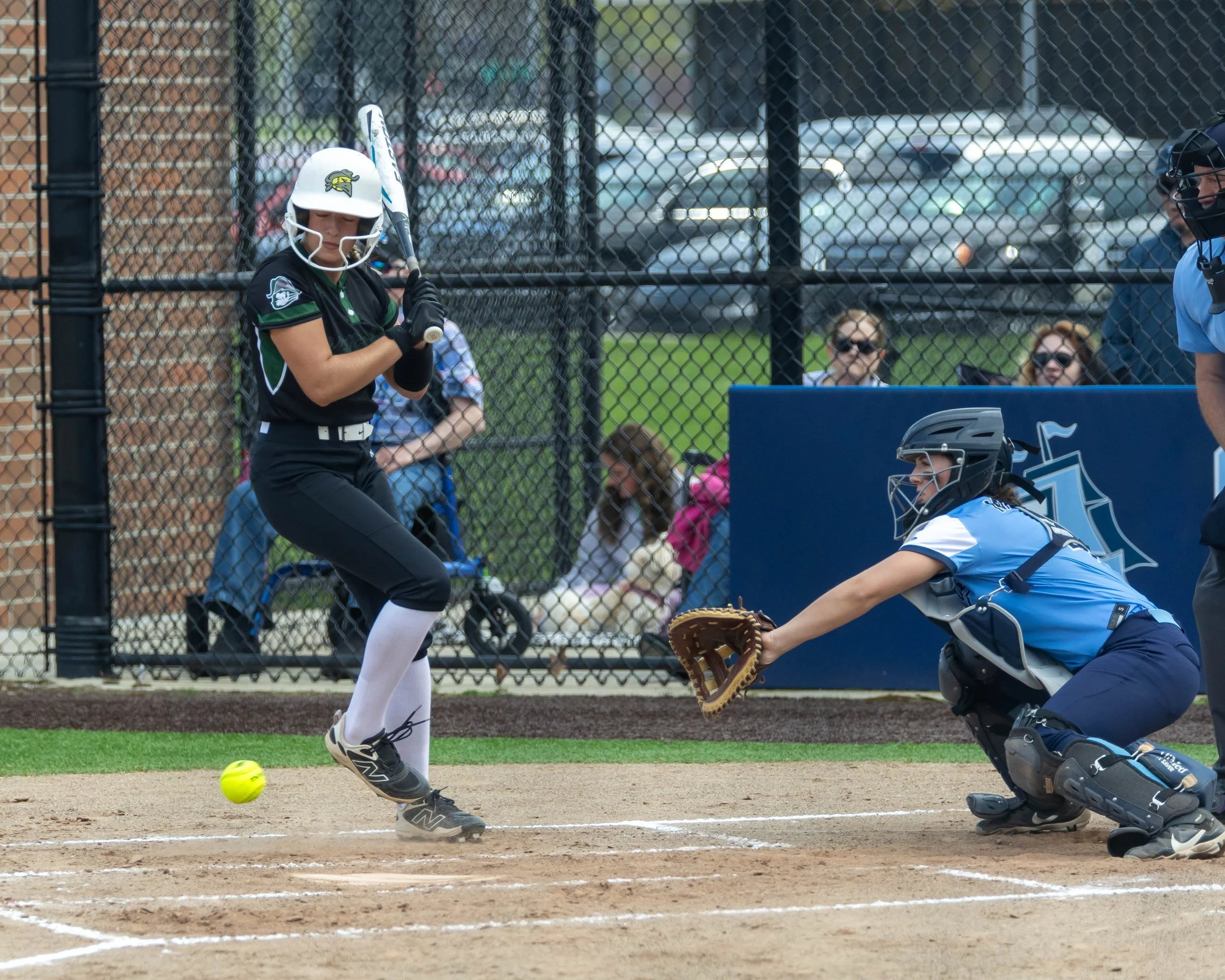 Kettering player takes a ball in the dirt