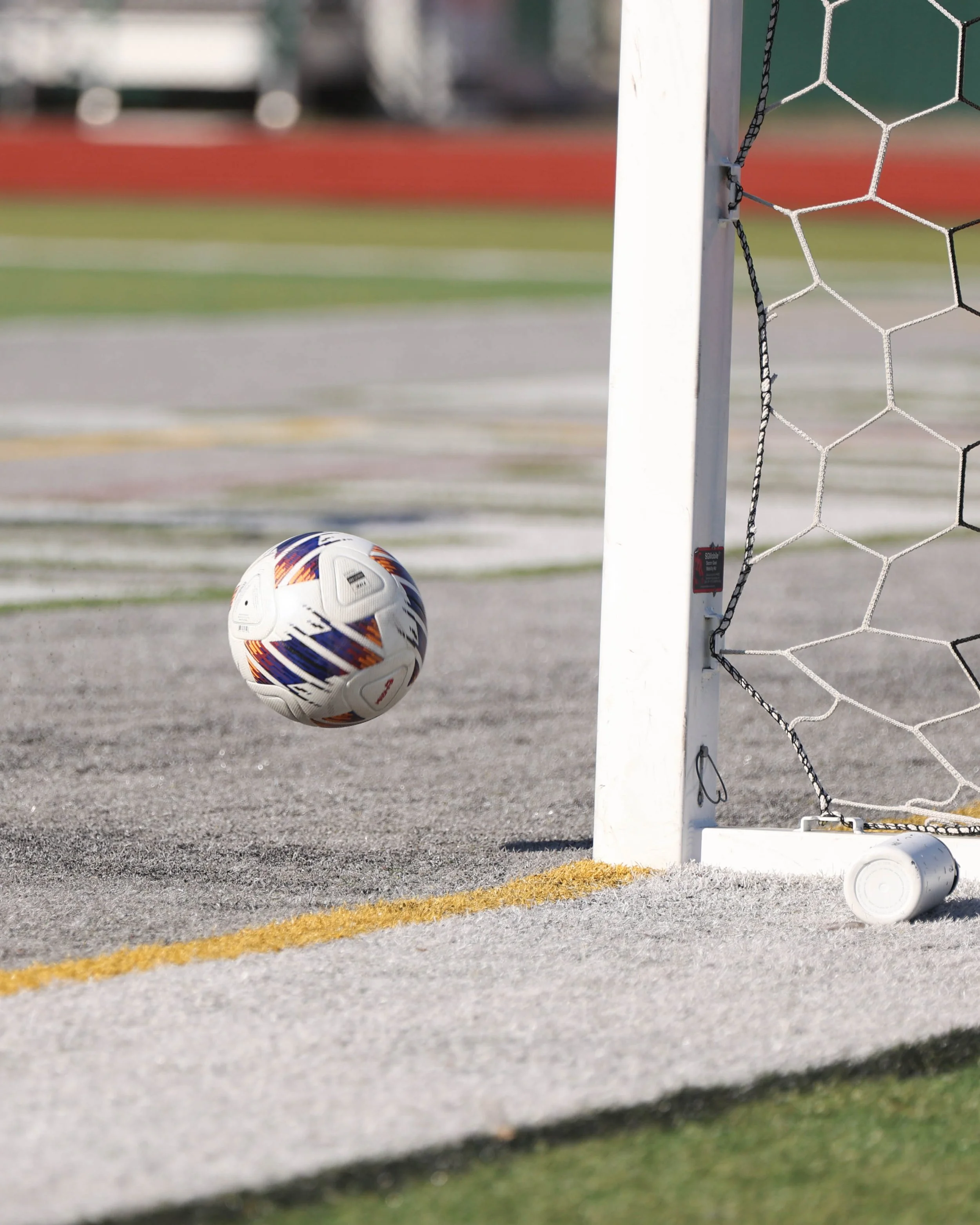 the ball goes just past the open net